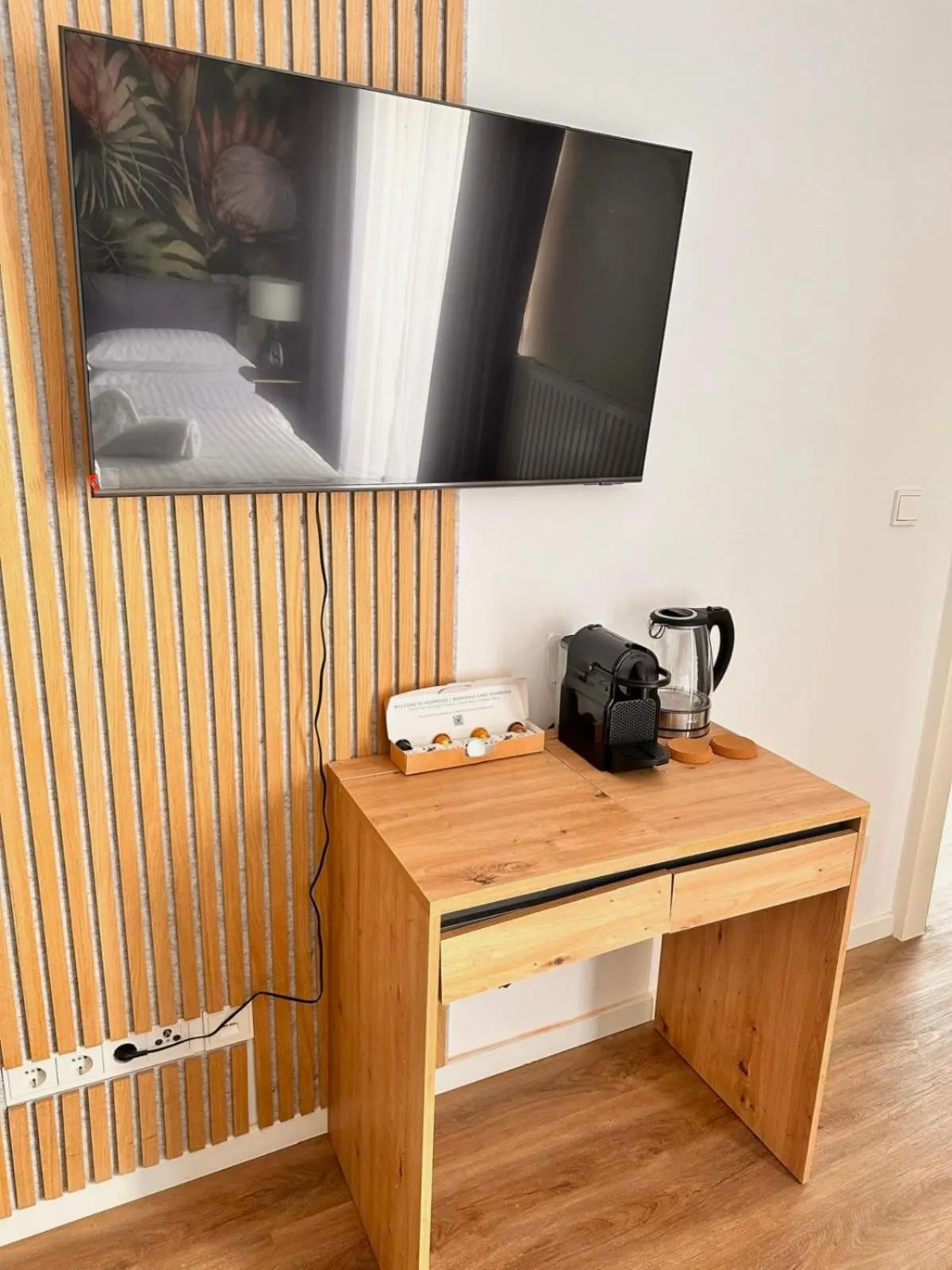 TV and multimedia in BOSSA CITY Design Apartments