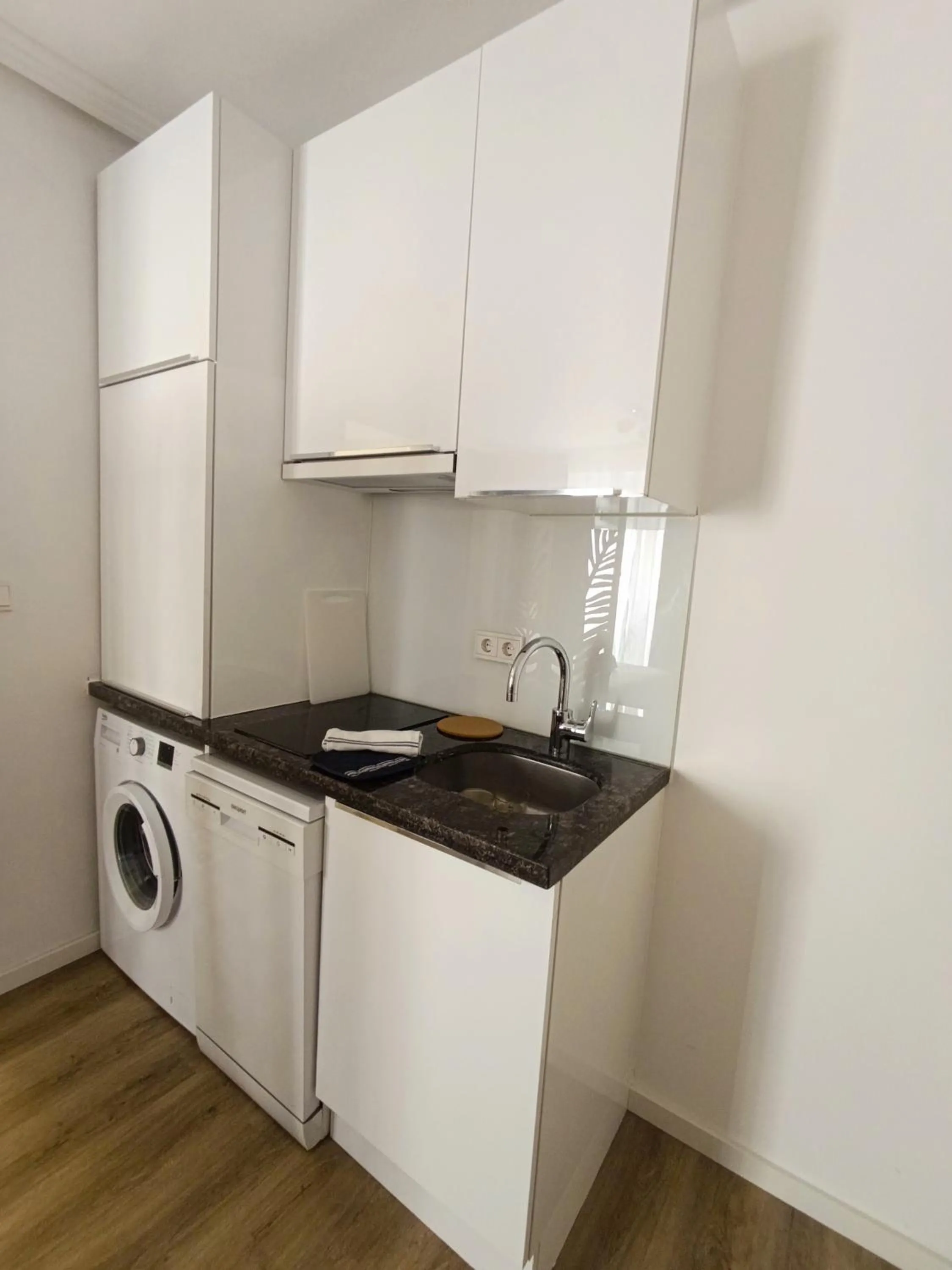 Kitchen or kitchenette in BOSSA CITY Design Apartments