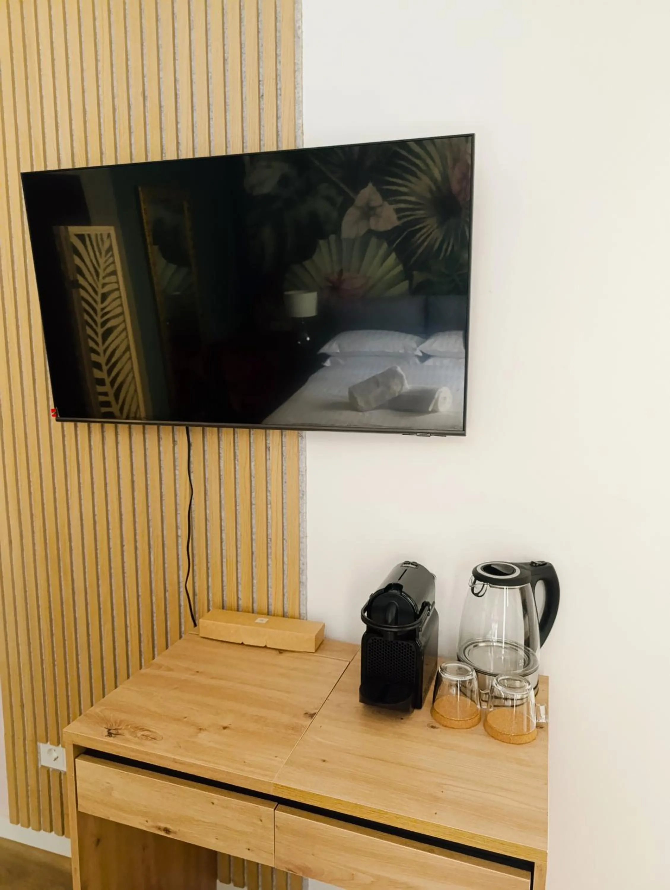 TV and multimedia in BOSSA CITY Design Apartments