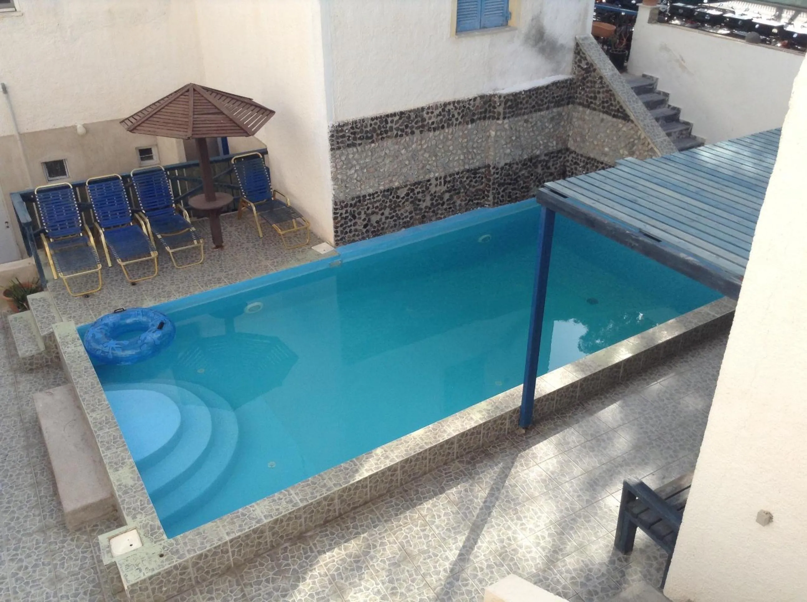 Swimming pool in Rooms to let Katerina & John's