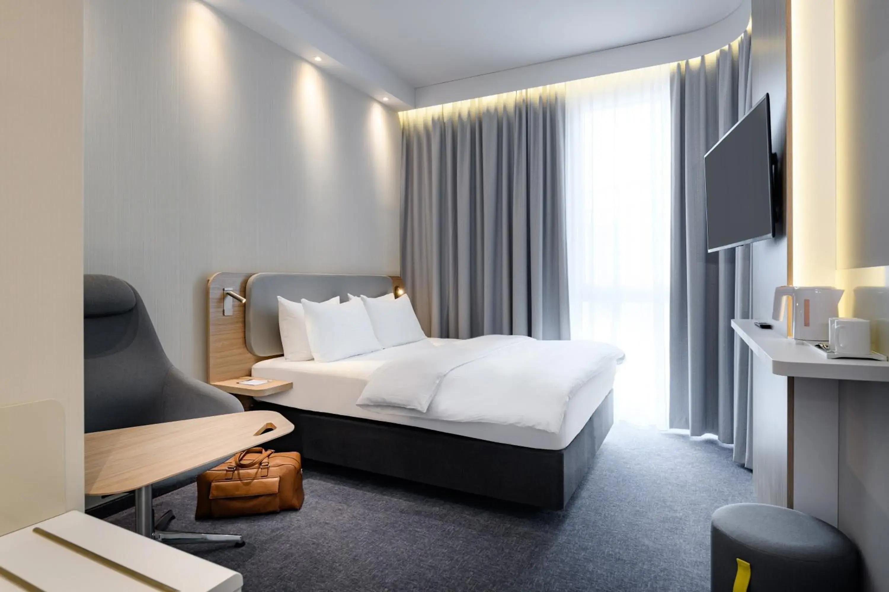 Photo of the whole room, Bed in Holiday Inn Express Munich Airport - Erding by IHG Photo of the whole room, Bed in Holiday Inn Express Munich Airport - Erding by IHG
