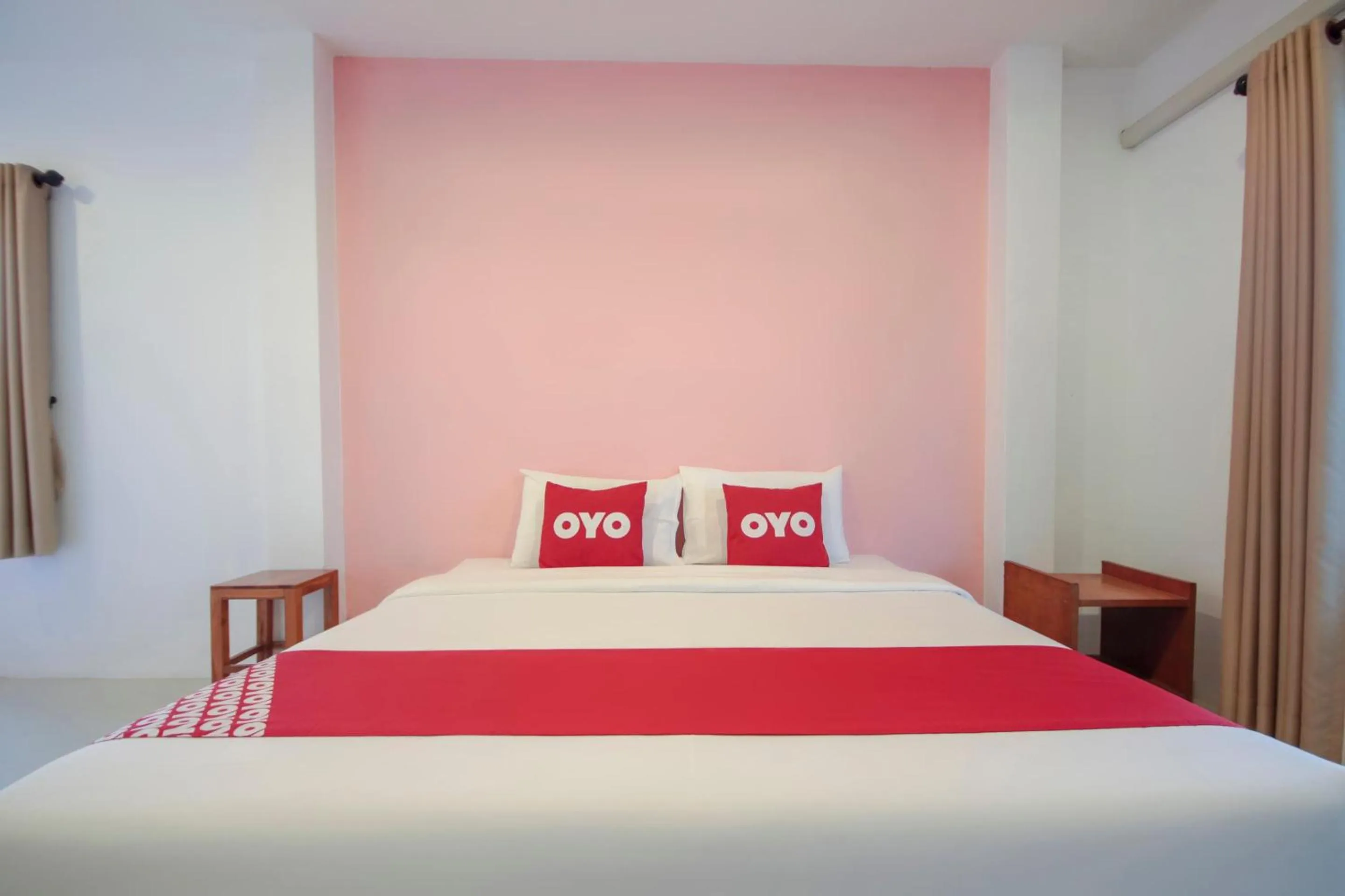 Bedroom in OYO 1120 The Royhanna Beach Home