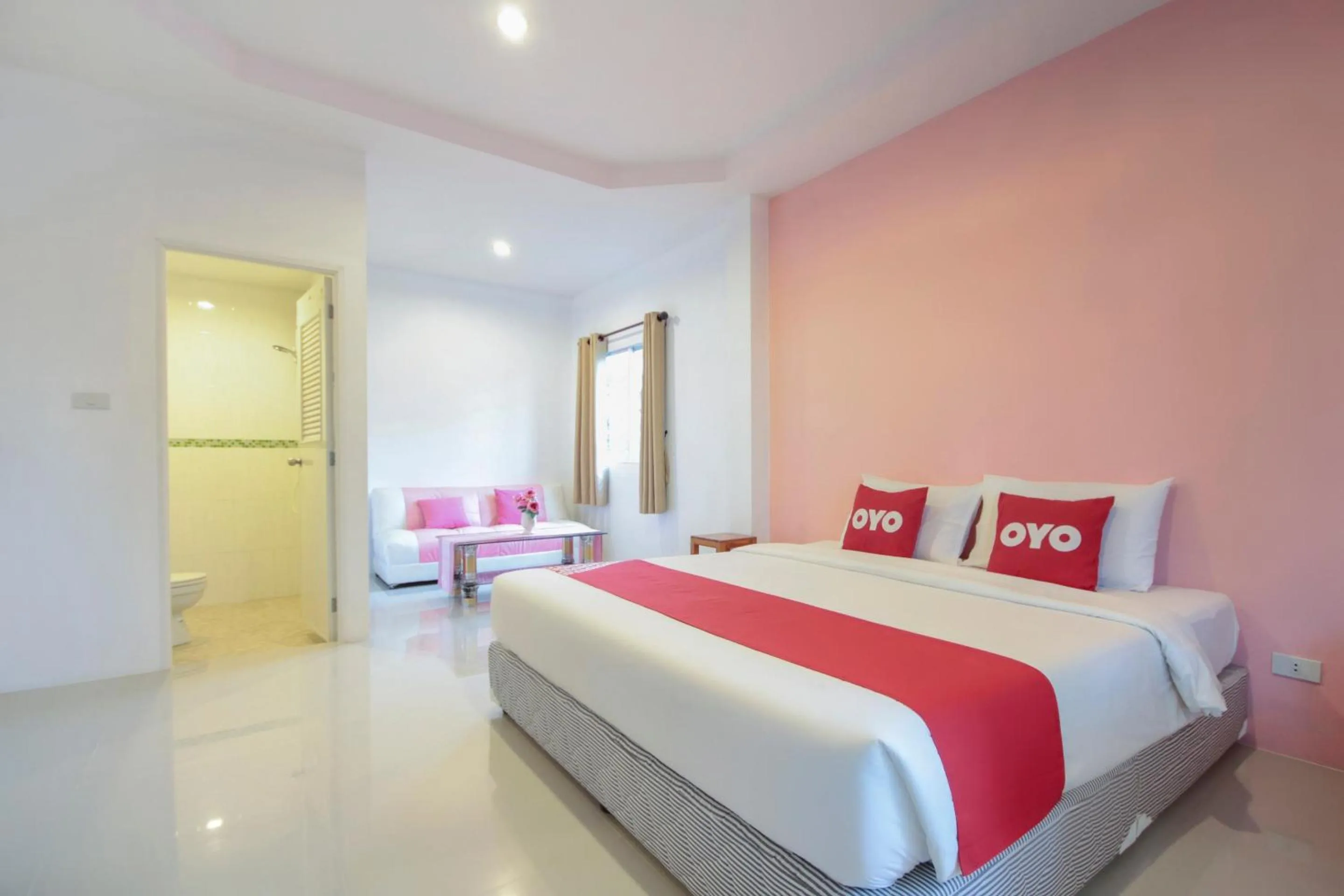 Bedroom in OYO 1120 The Royhanna Beach Home