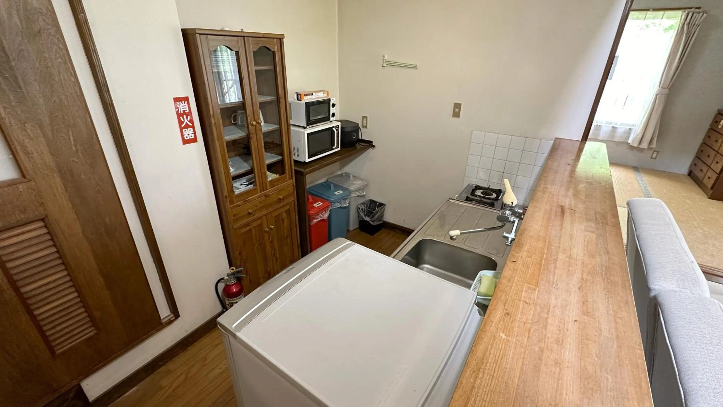 Kitchen or kitchenette in Nature Cottage Akabeko