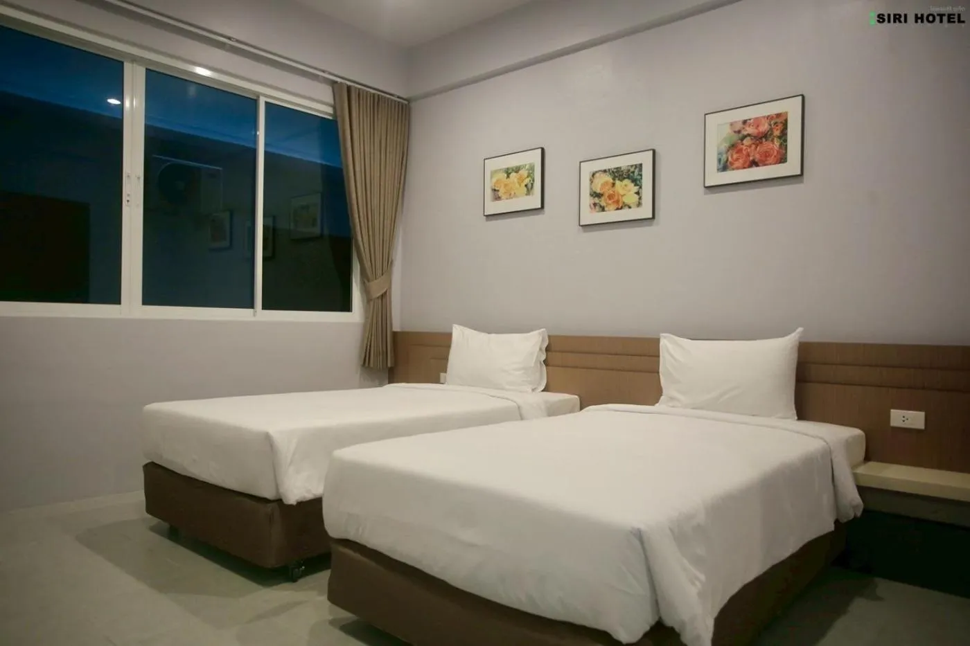 Bed in Siri Hotel Phuket