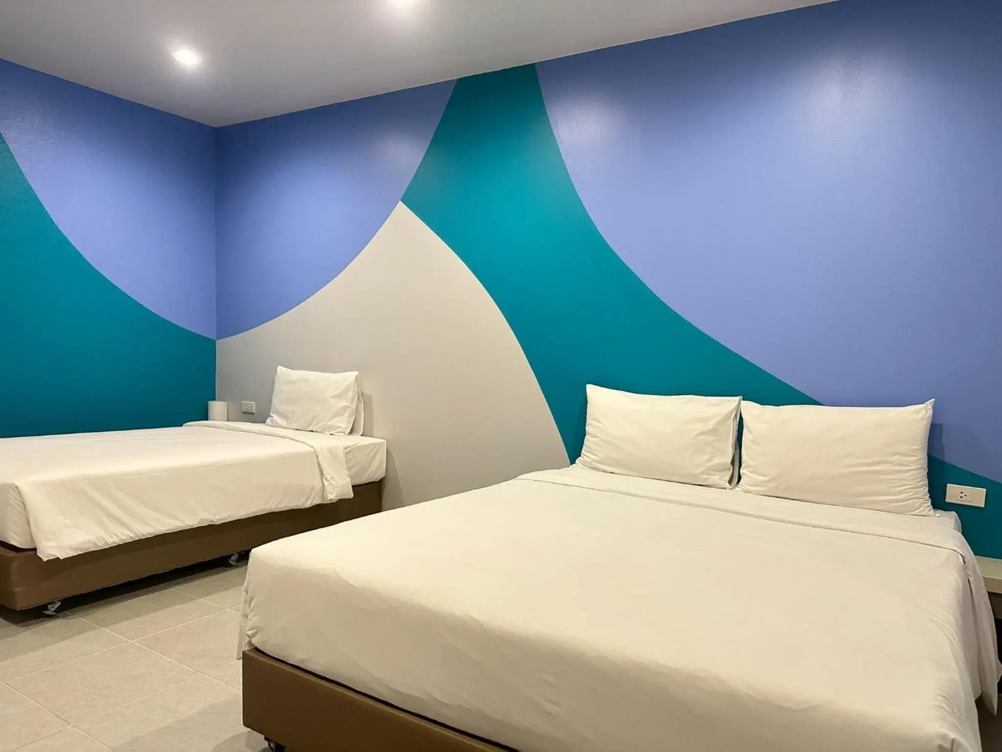 Bed in Siri Hotel Phuket Bed in Siri Hotel Phuket