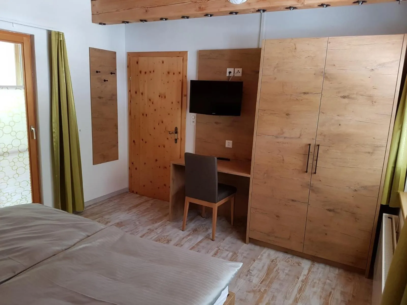 Seating area, Bed in Apartment Madlaina
