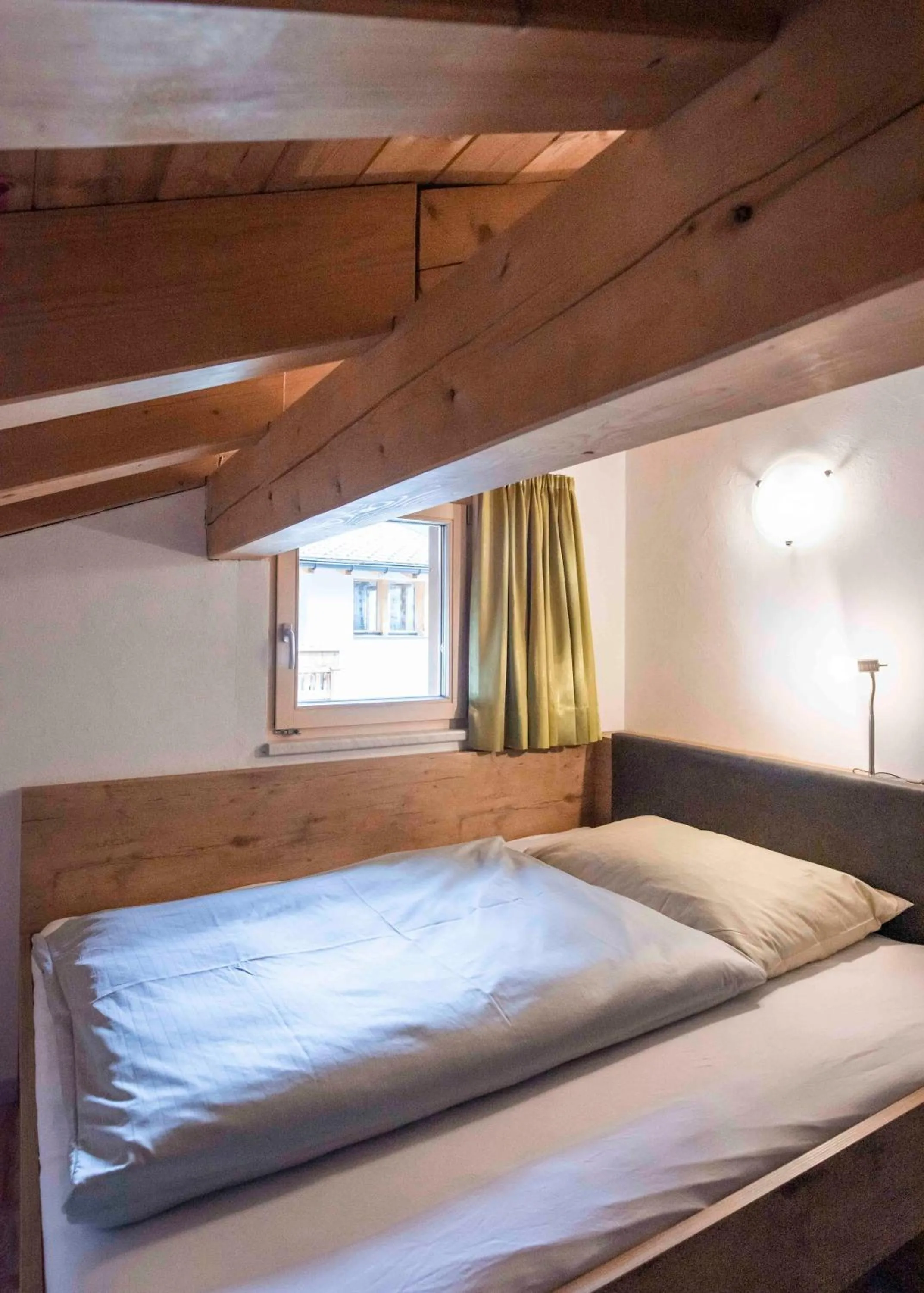 Bed in Apartment Madlaina
