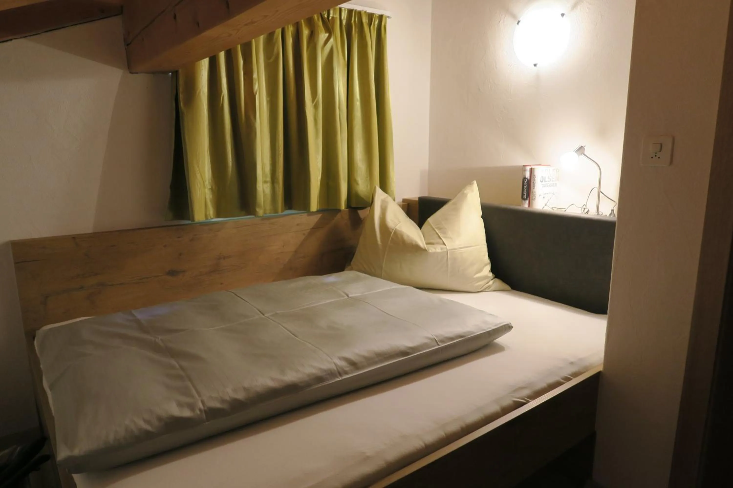 Bed in Apartment Madlaina