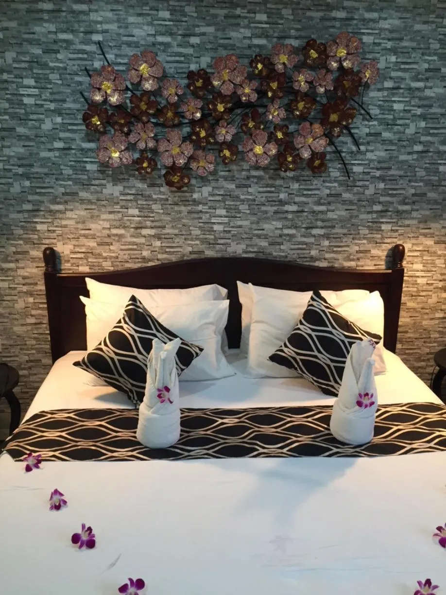 Bed in Fong Kaew and Baan Nang Fa Guesthouse