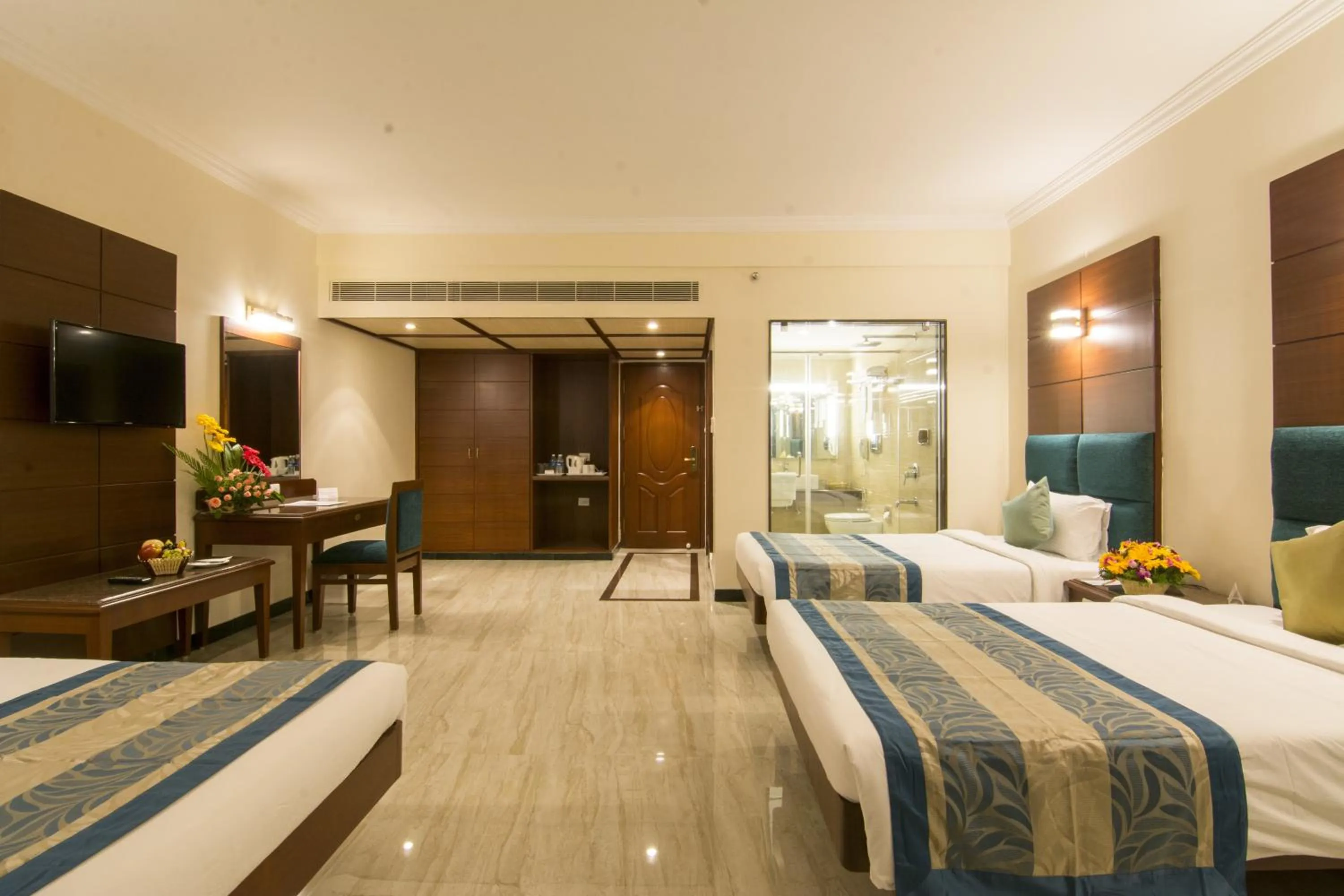 Photo of the whole room, Bed in Shenbaga Hotel And Convention Centre