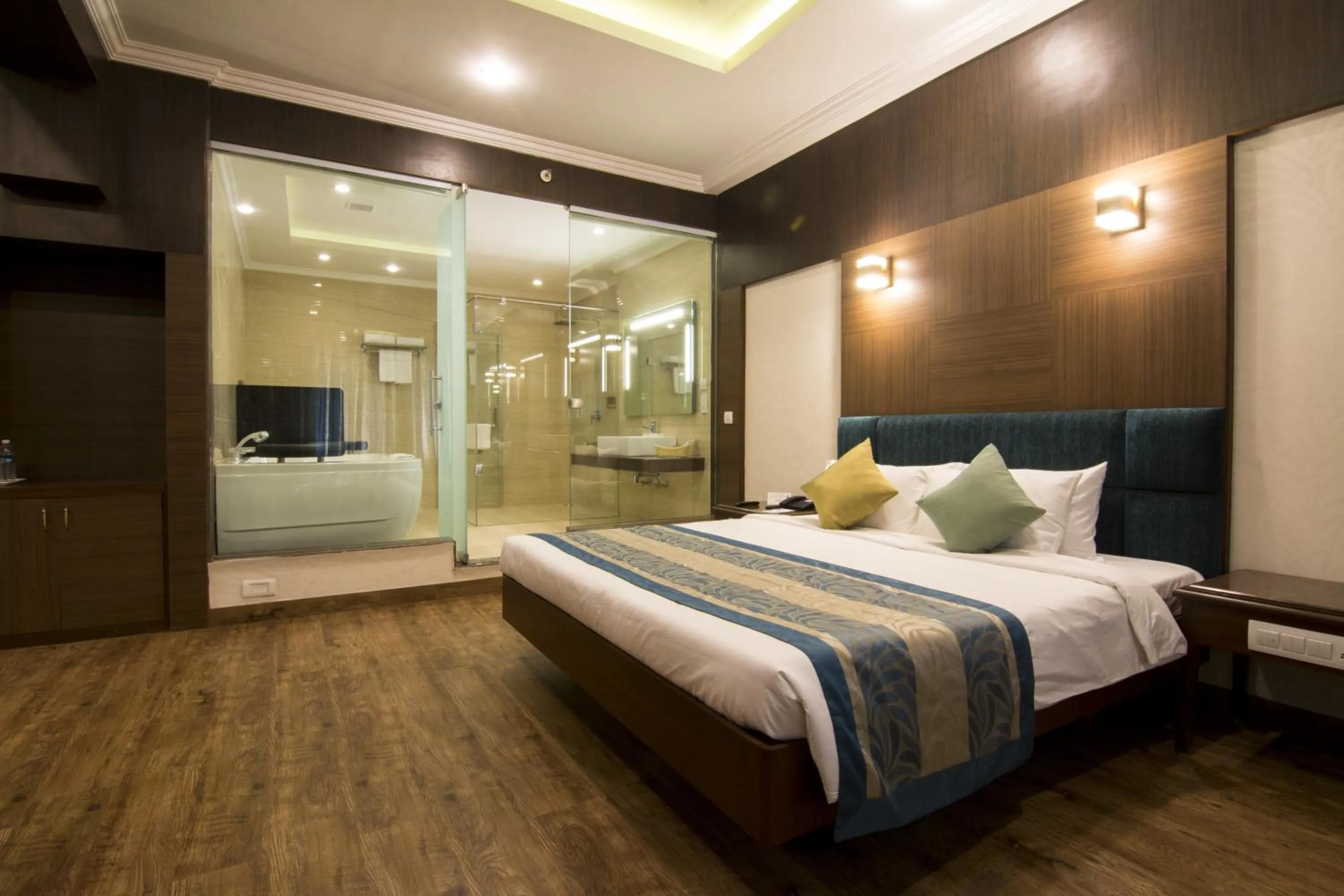 Photo of the whole room, Bed in Shenbaga Hotel And Convention Centre