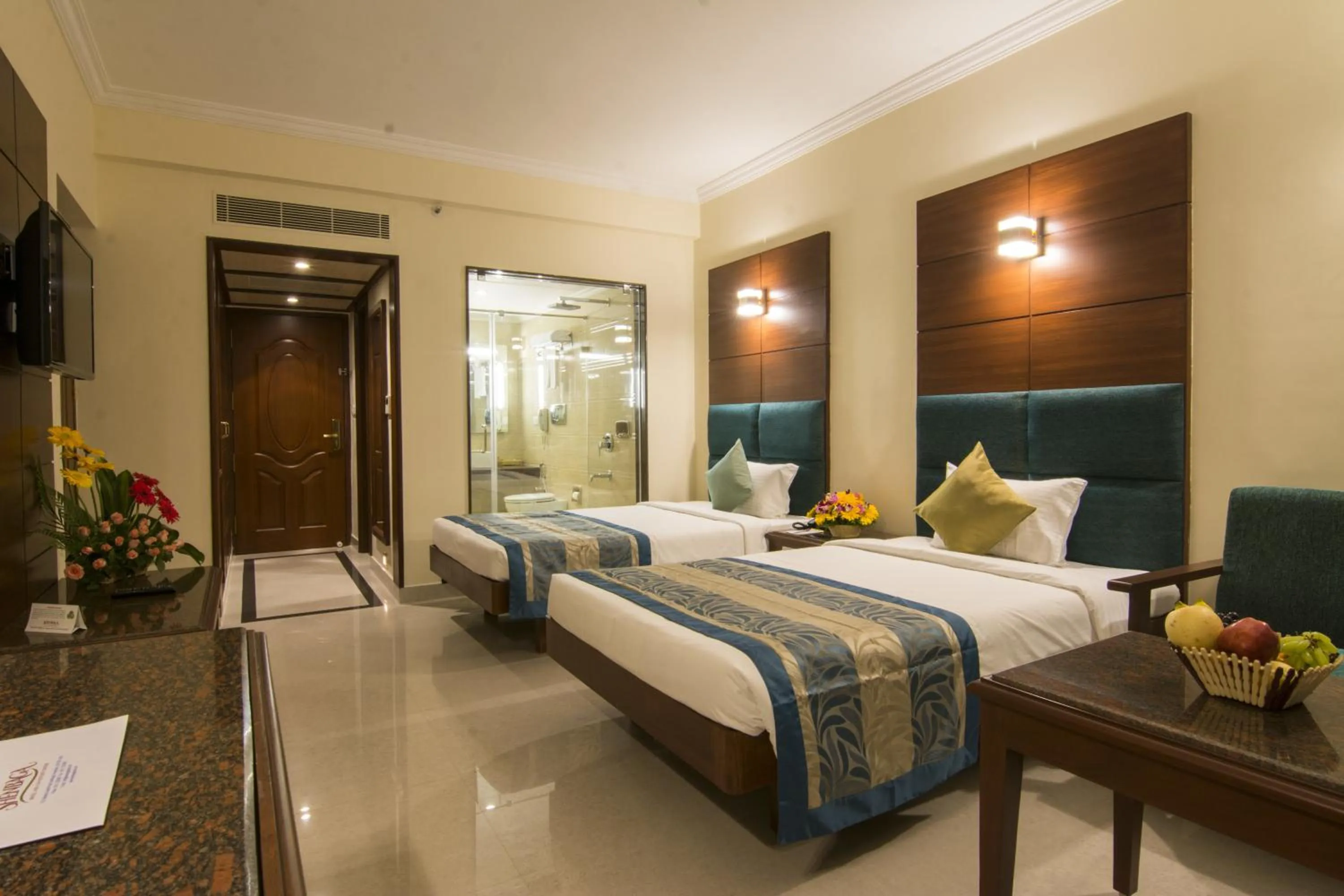 Photo of the whole room, Bed in Shenbaga Hotel And Convention Centre