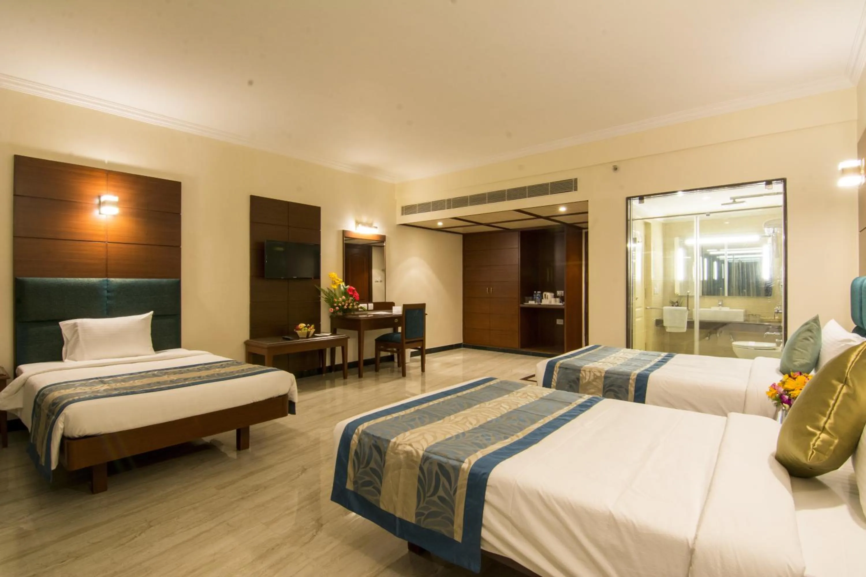Photo of the whole room, Bed in Shenbaga Hotel And Convention Centre