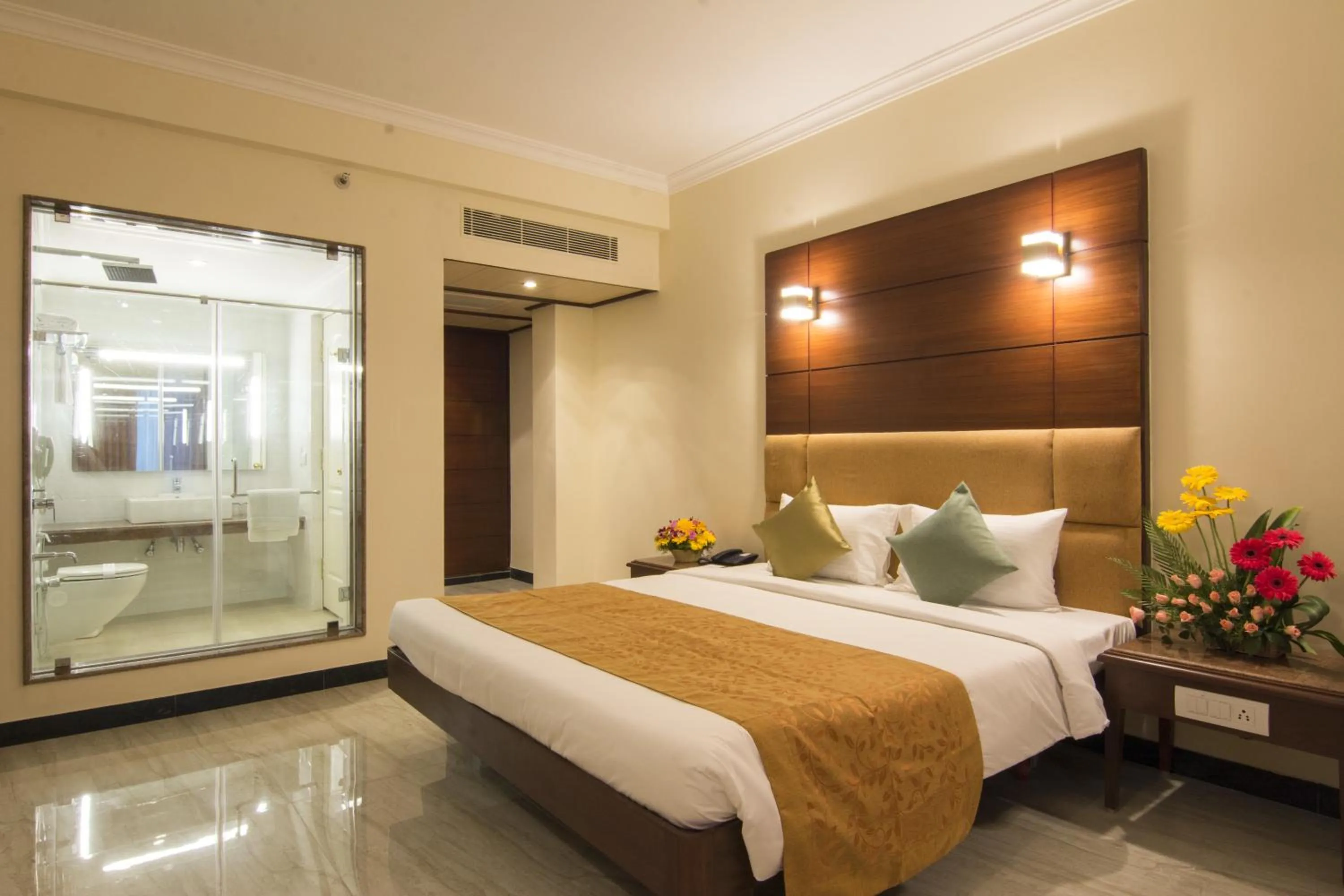 Photo of the whole room, Bed in Shenbaga Hotel And Convention Centre