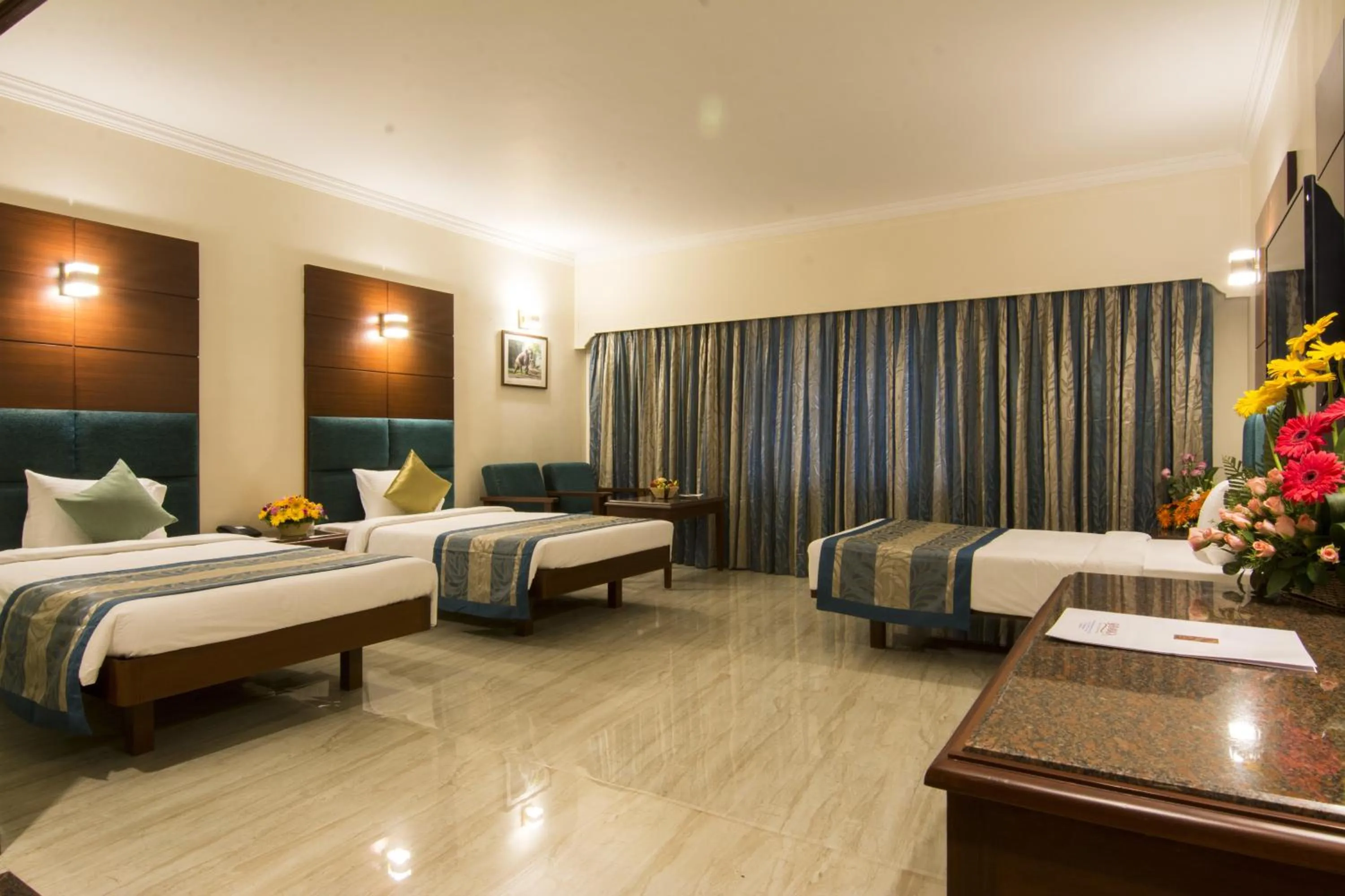Photo of the whole room, Bed in Shenbaga Hotel And Convention Centre