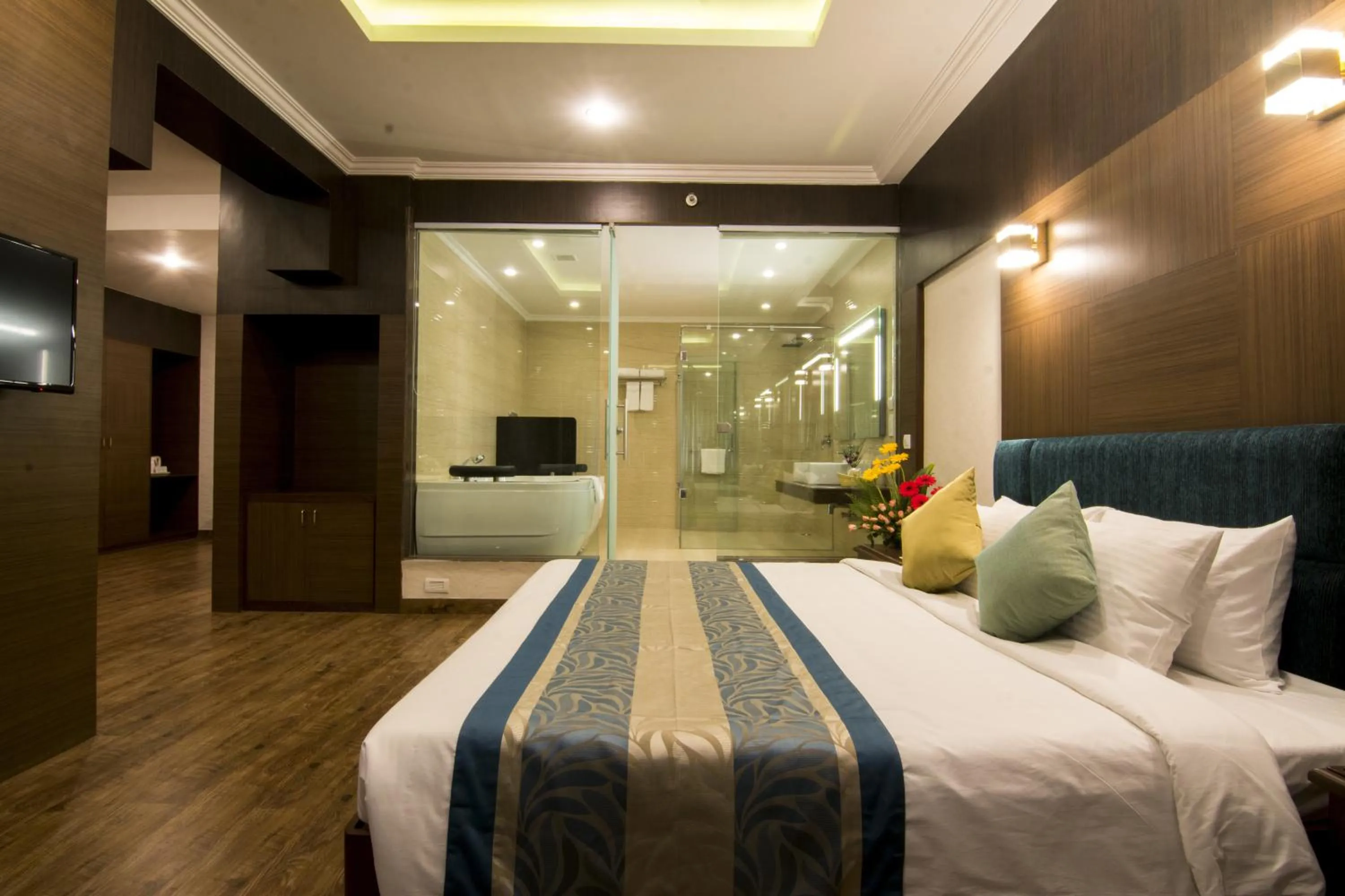 Photo of the whole room, Bed in Shenbaga Hotel And Convention Centre