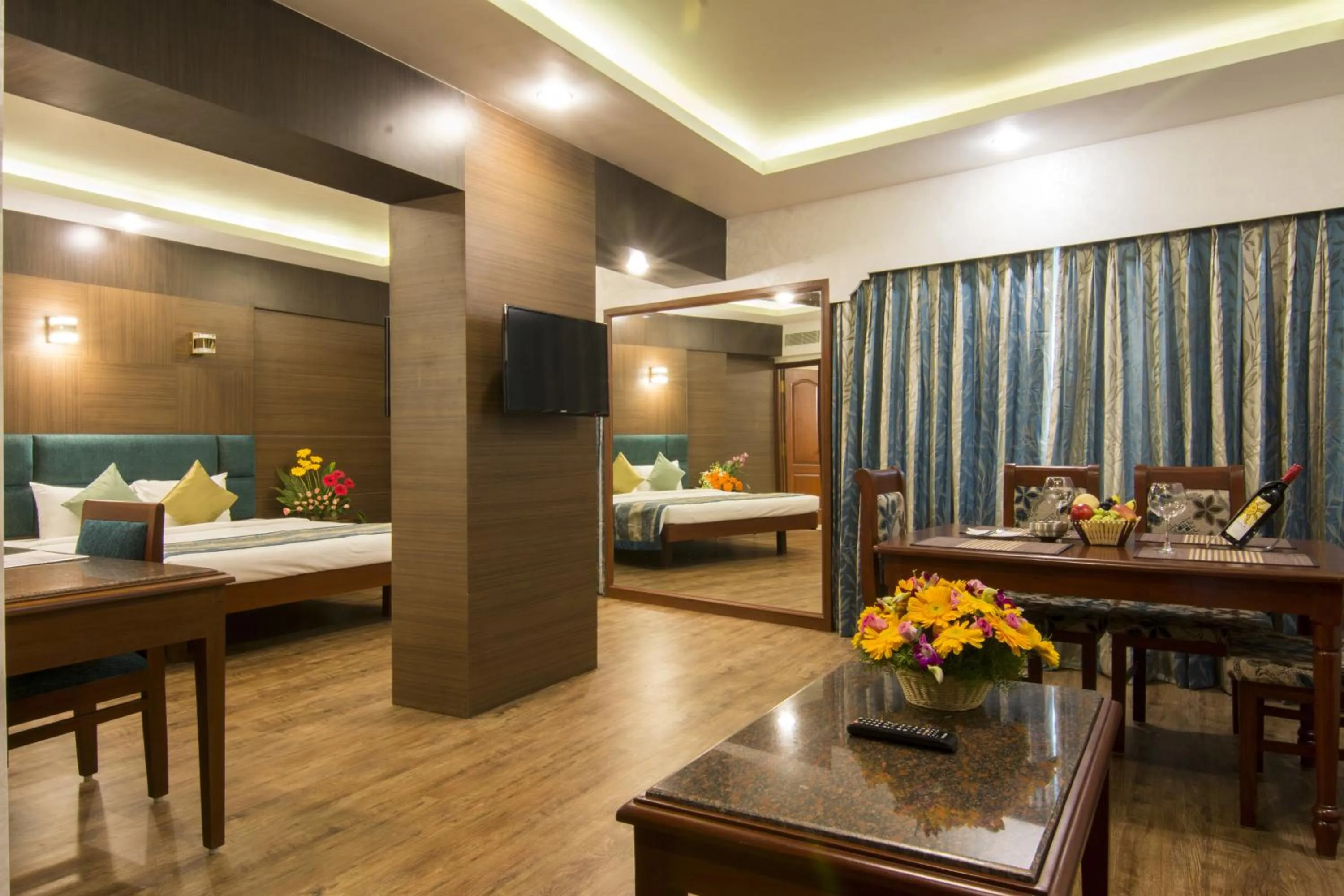 Photo of the whole room, Bed in Shenbaga Hotel And Convention Centre