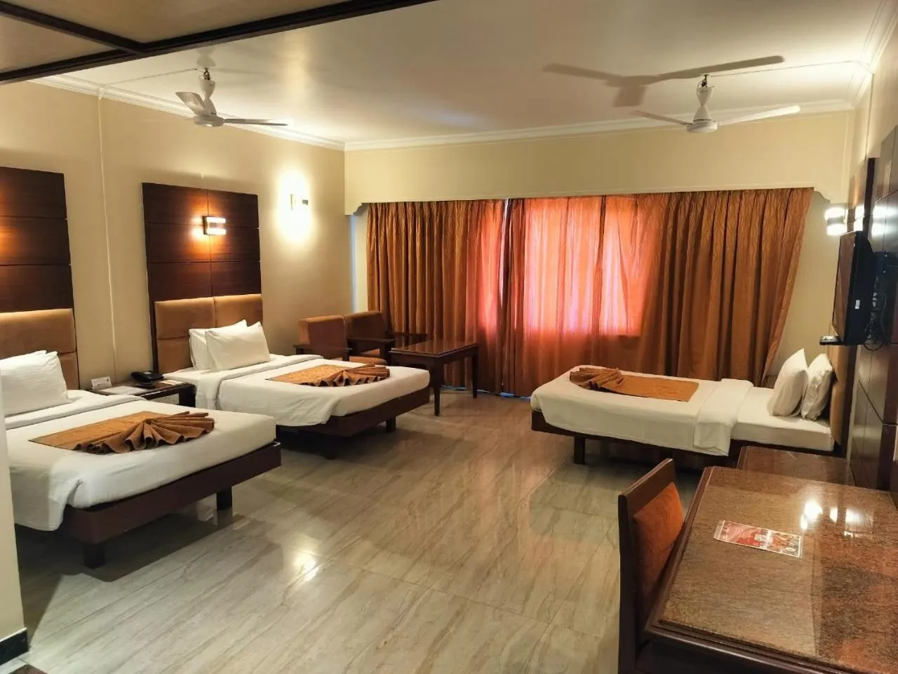 Photo of the whole room, Bed in Shenbaga Hotel And Convention Centre