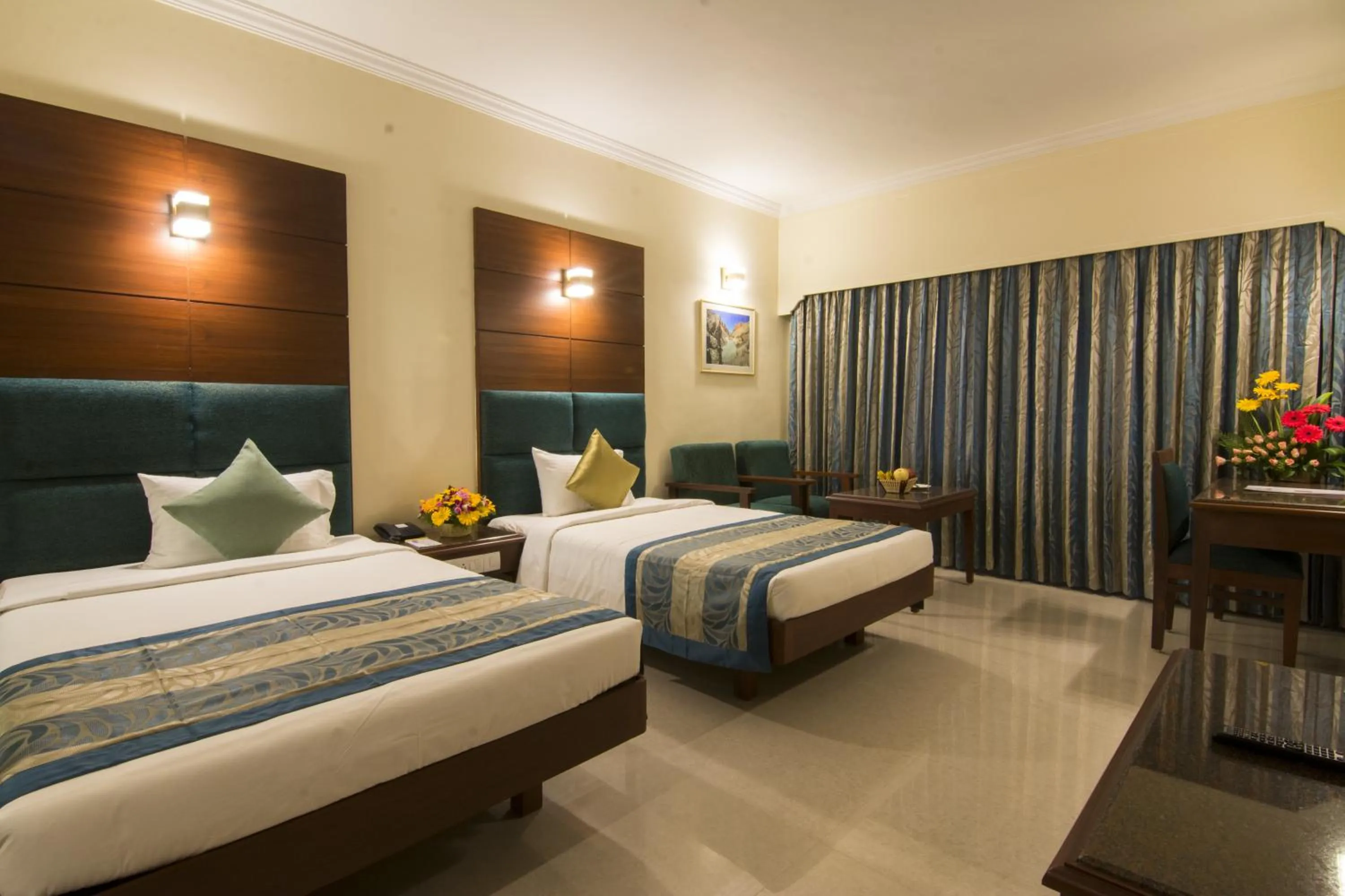 Photo of the whole room, Bed in Shenbaga Hotel And Convention Centre