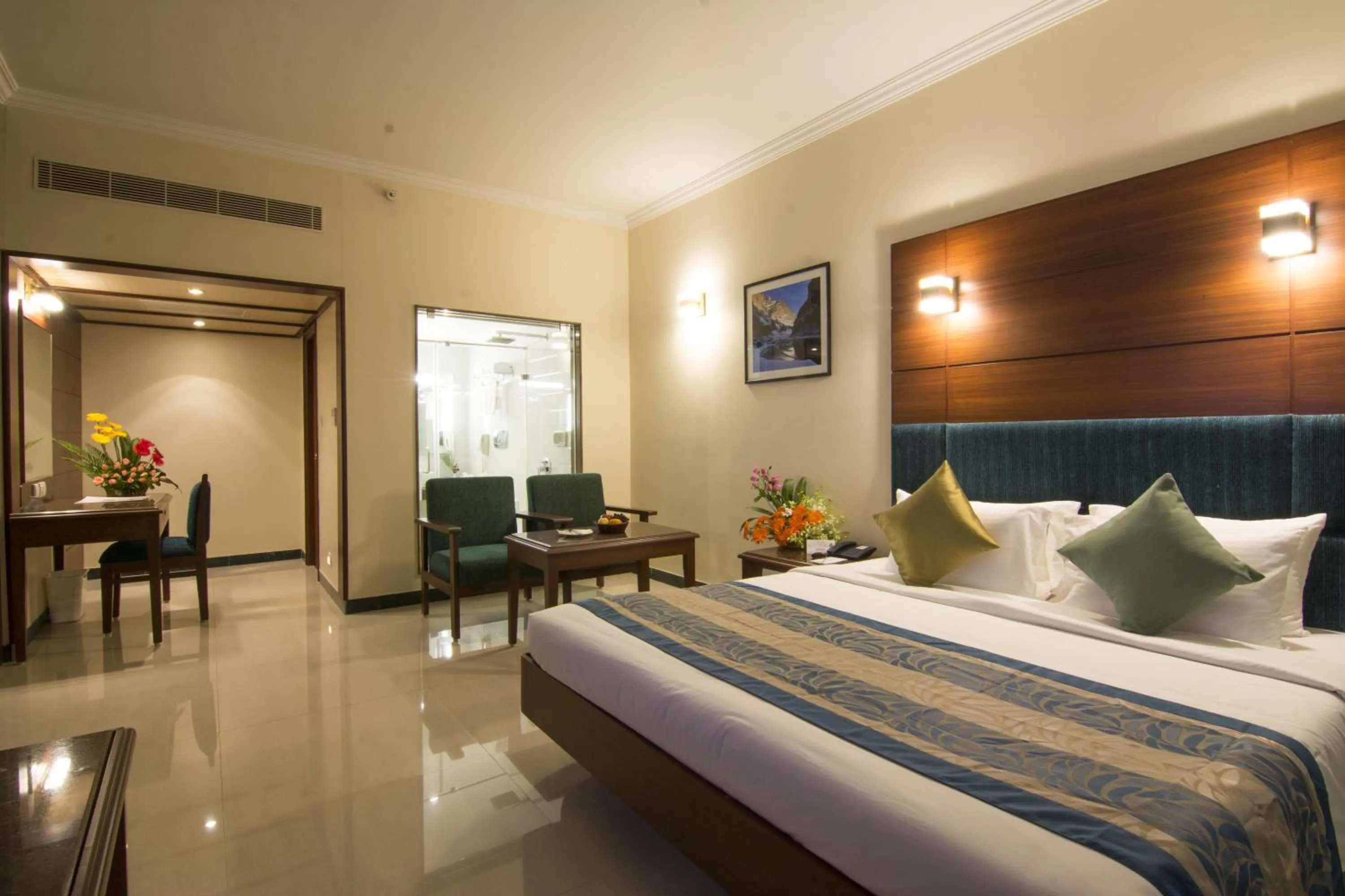 Photo of the whole room, Bed in Shenbaga Hotel And Convention Centre