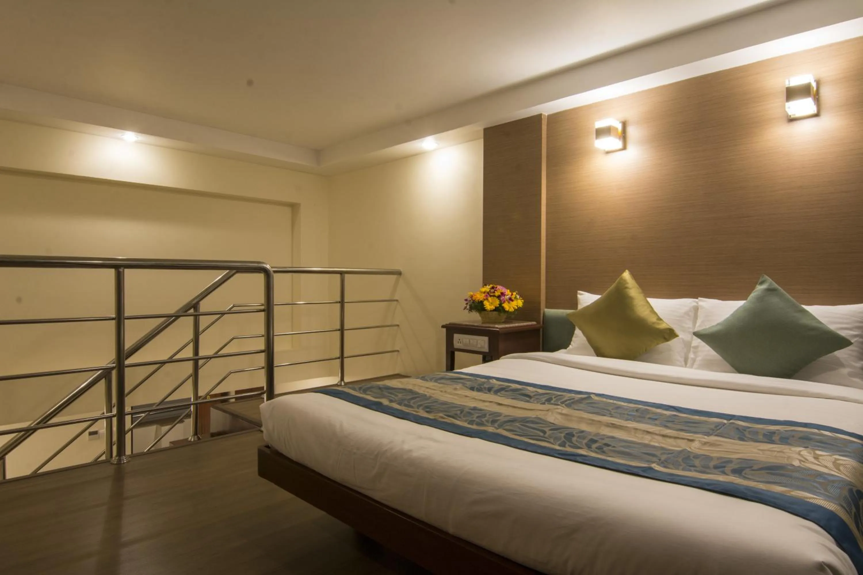 Photo of the whole room, Bed in Shenbaga Hotel And Convention Centre