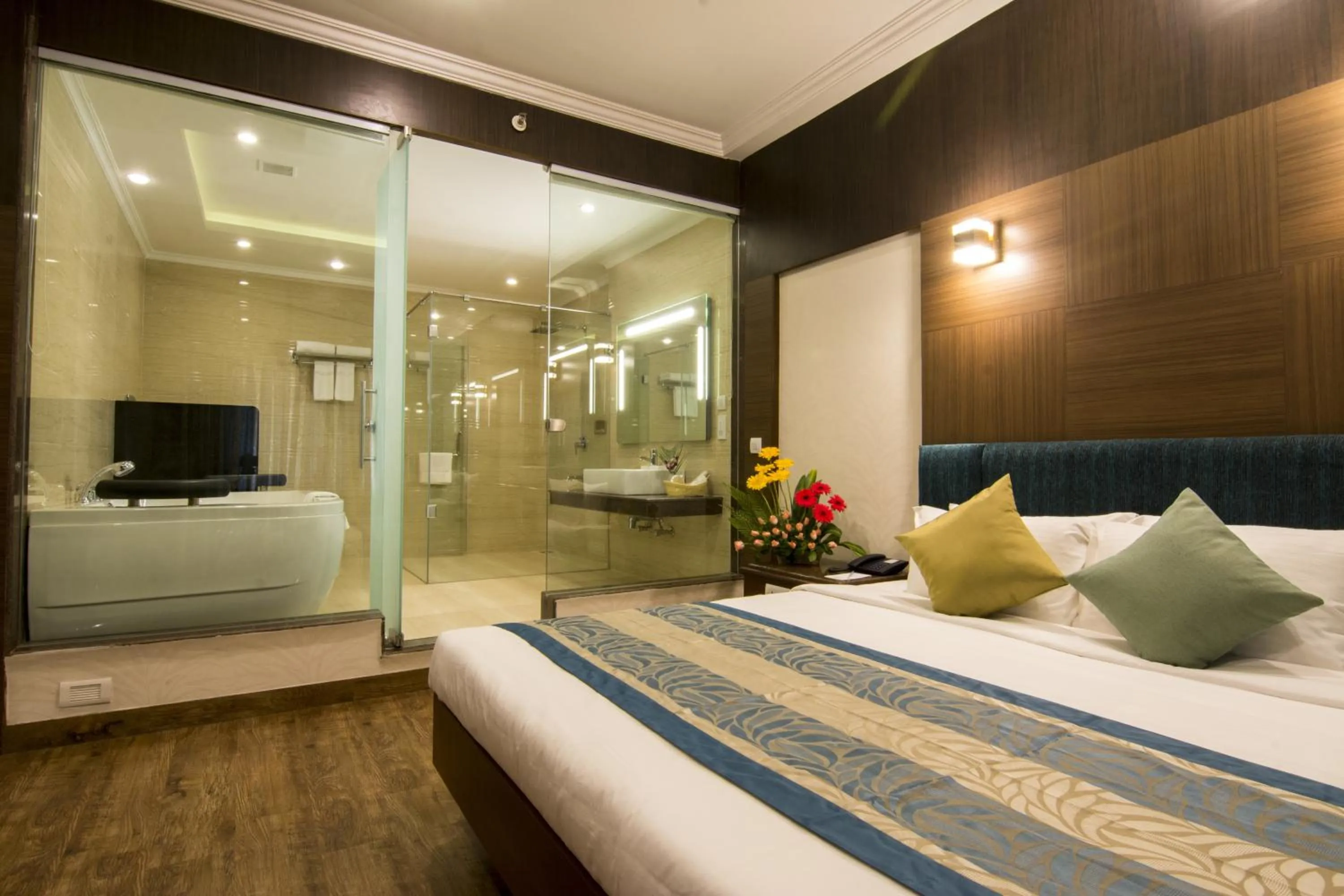 Photo of the whole room, Bed in Shenbaga Hotel And Convention Centre