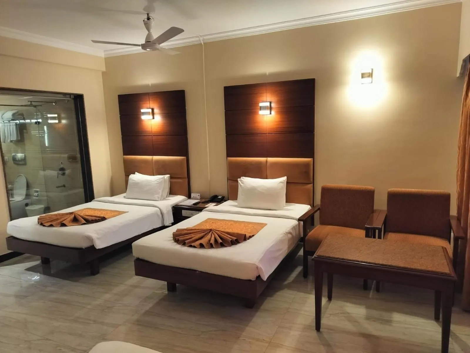 Photo of the whole room, Bed in Shenbaga Hotel And Convention Centre