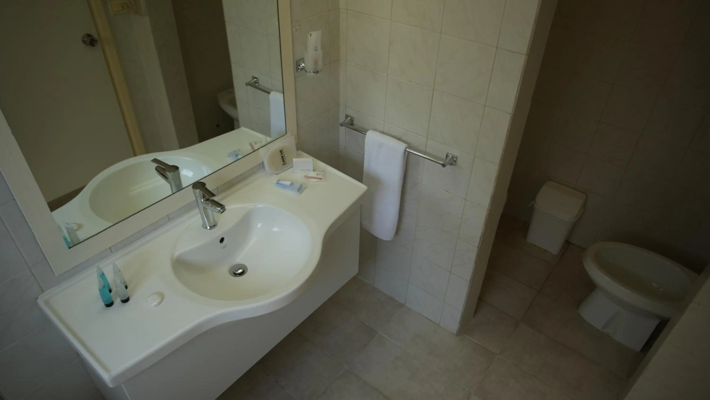 Toilet in Manara Riva Suites