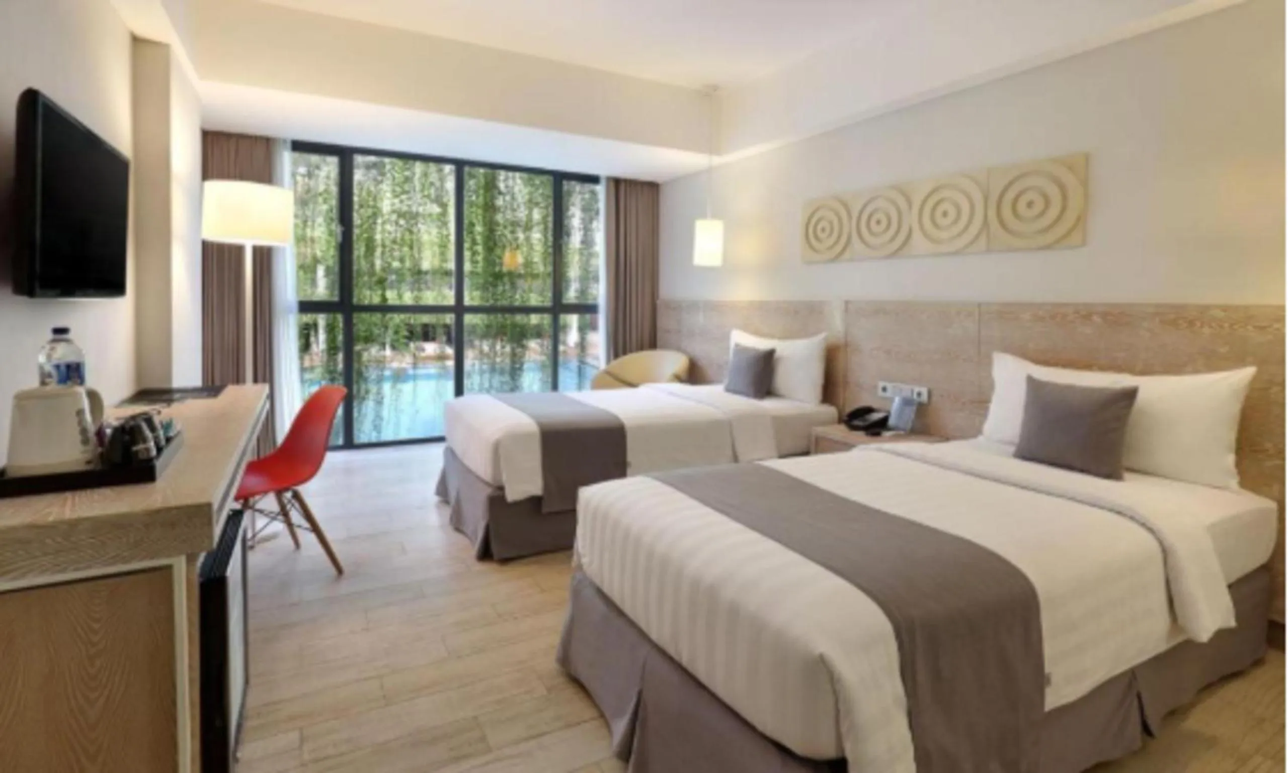 Bed in Hotel NEO+ Kuta Legian by ASTON