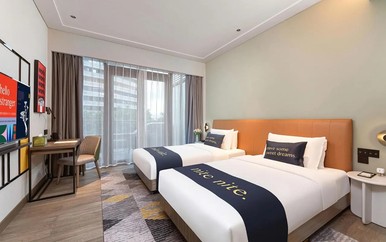 Bed in The Mustel Hotel Chongqing Hongyadong