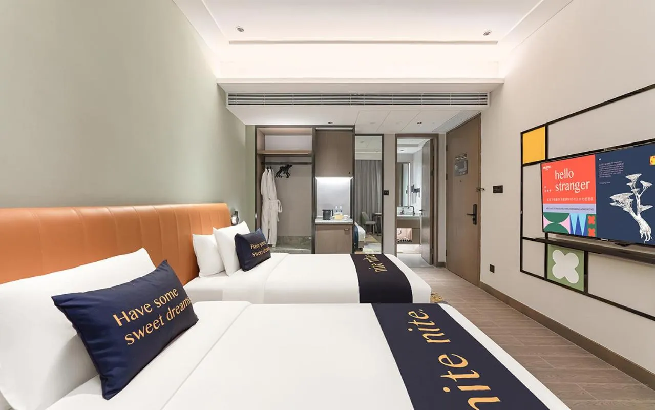 Bed in The Mustel Hotel Chongqing Hongyadong