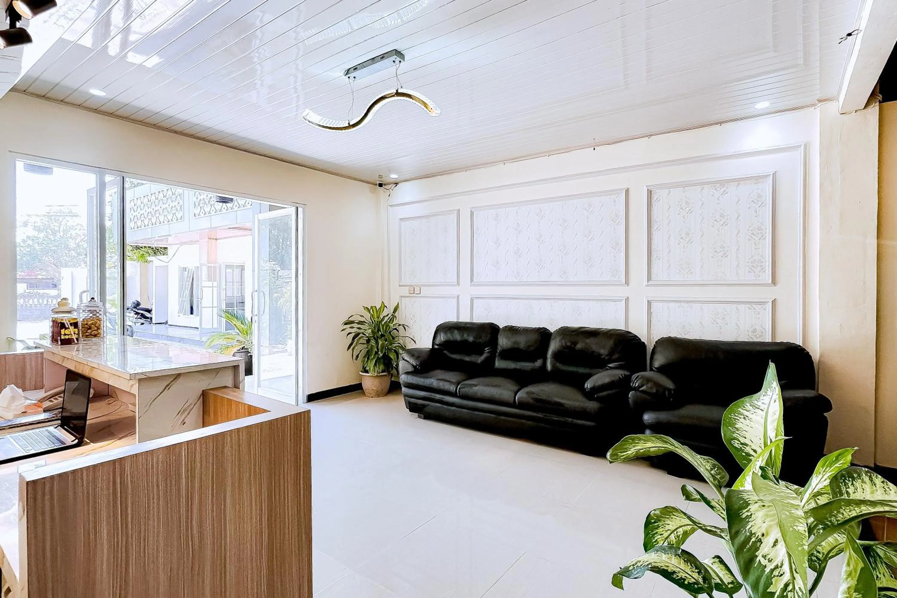 Seating area in RedDoorz Plus at GNG Hotel El Tari Airport Kupang