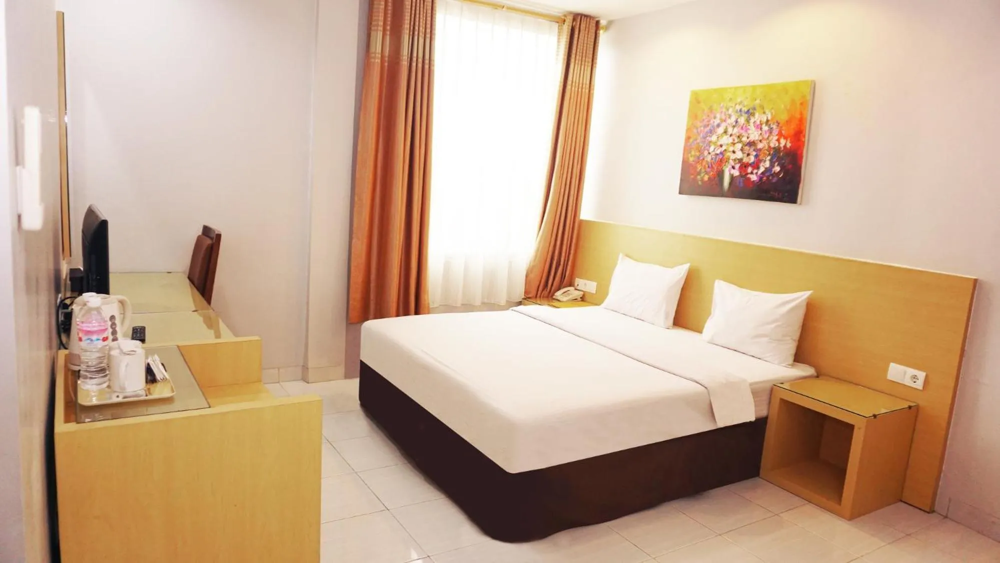 Bed in Grande Hotel Lampung Powered by Archipelago