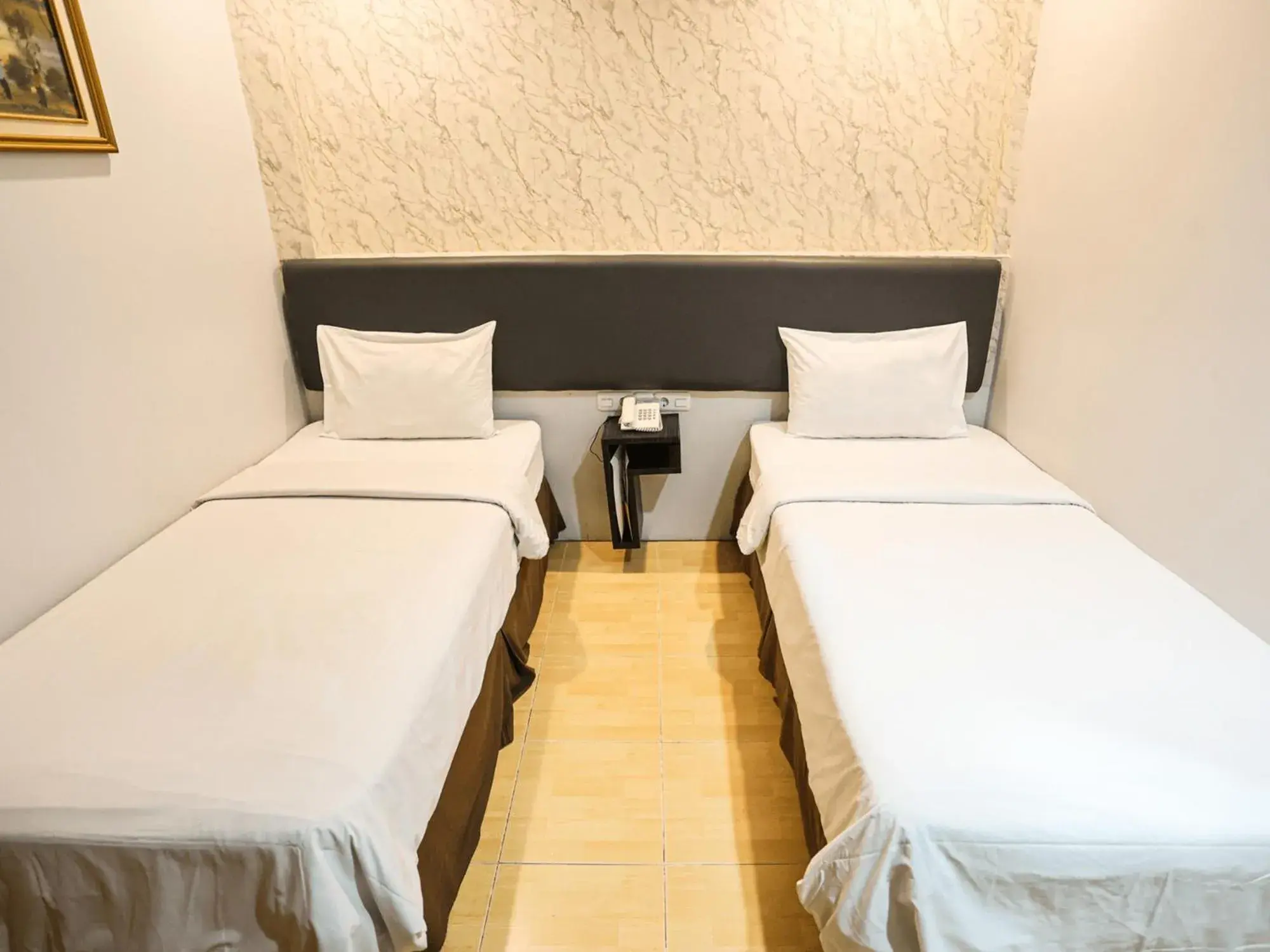 Bed in Grande Hotel Lampung Powered by Archipelago Bed in Grande Hotel Lampung Powered by Archipelago