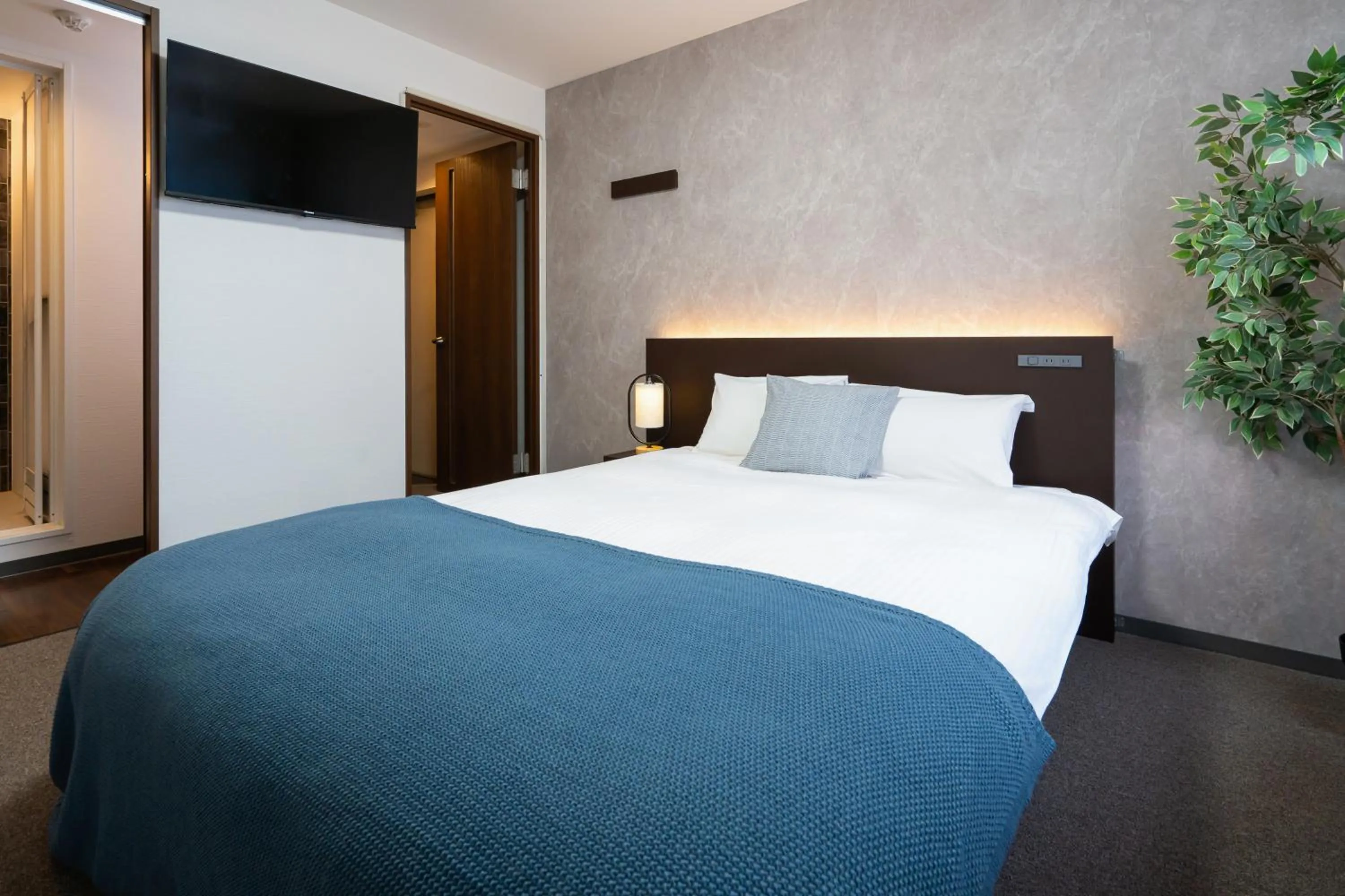 Bed in Residence Hotel Sapporo Susukino