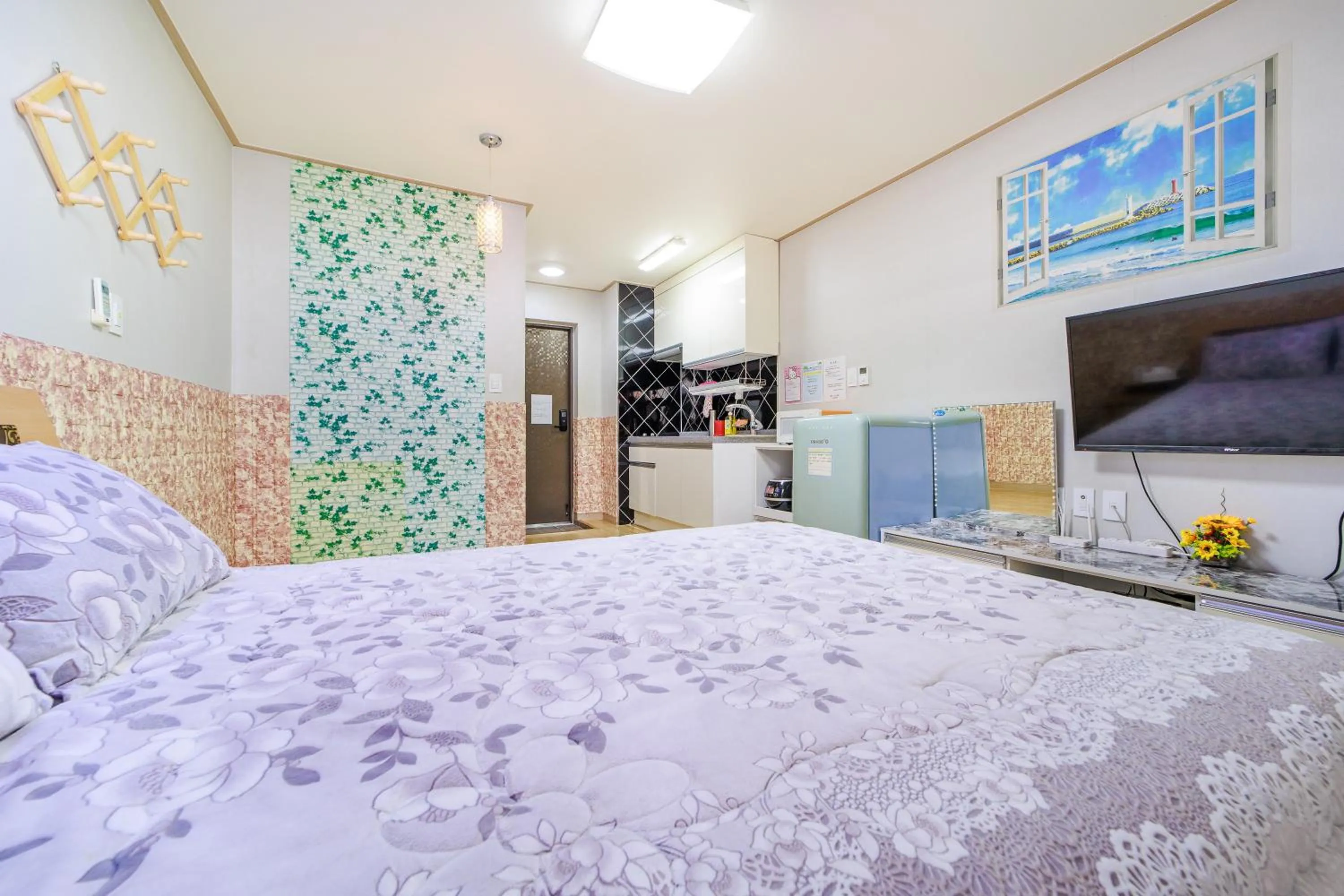 Bed in Sokcho Santolini Pension