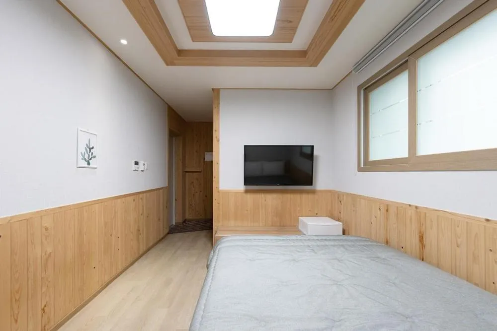 Bed in Gyeongju Guesthouse Picnic