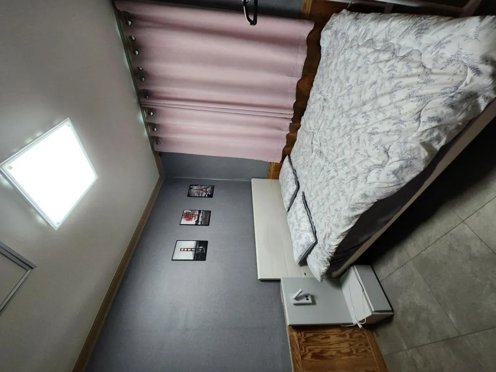 Bed in Yeosu Daoljang Guesthouse