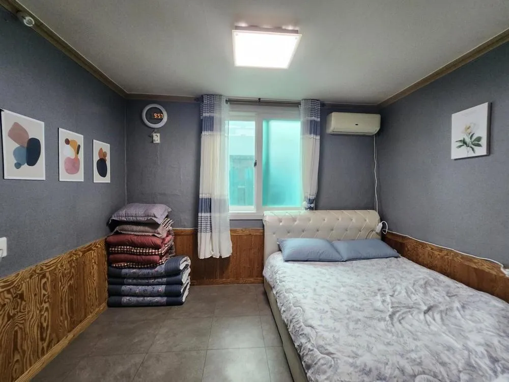 Bed in Yeosu Daoljang Guesthouse