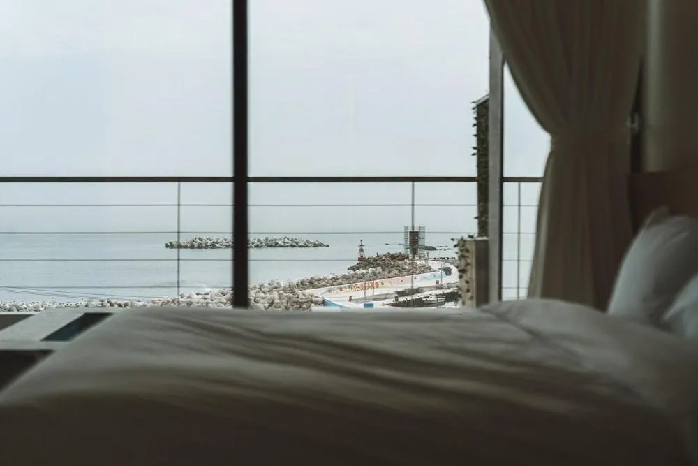 Bed in Pohang Madame Annette Pool Villa dogs allowed