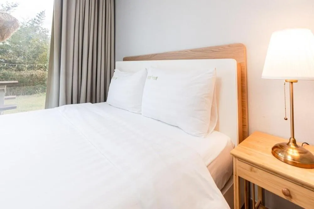 Bed in Jeju Aewolae Hyuyang Pension