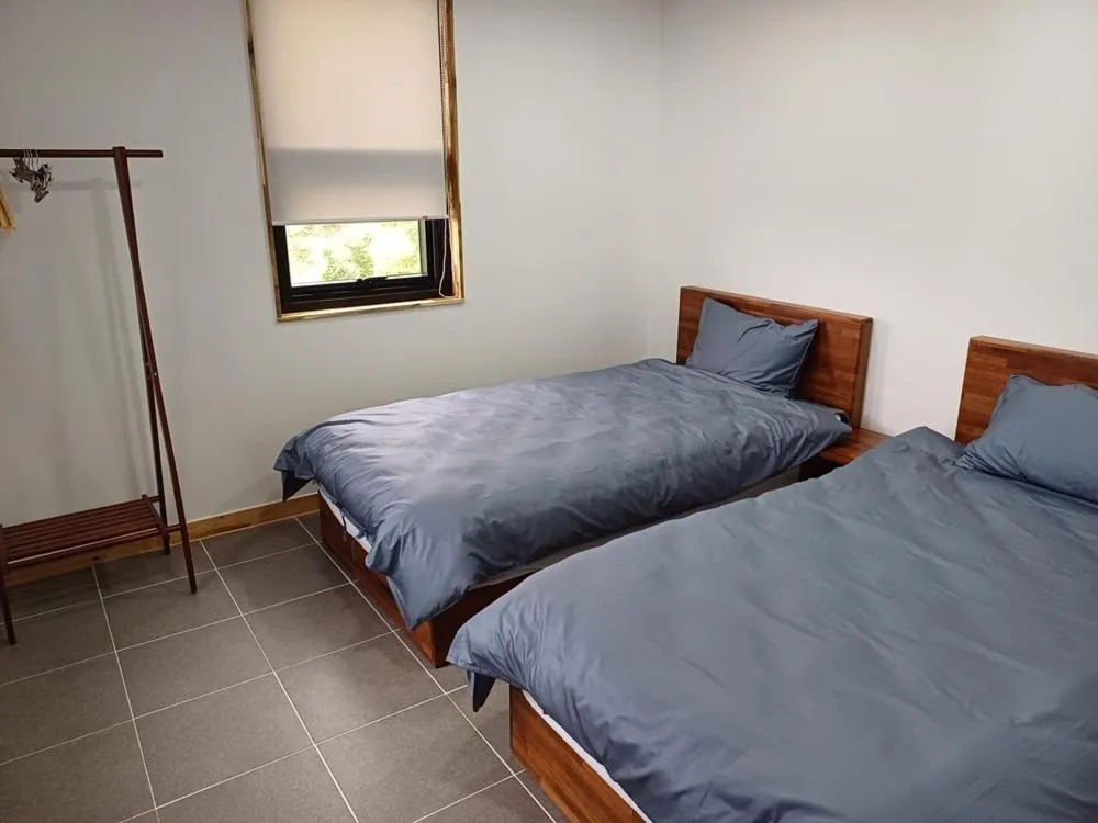 Bed in Road96 Caravan and Poolvilla