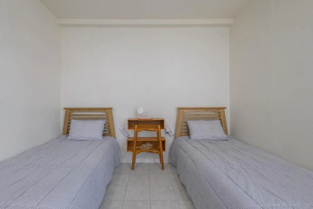 Bed in Geoje Yolo Guesthouse