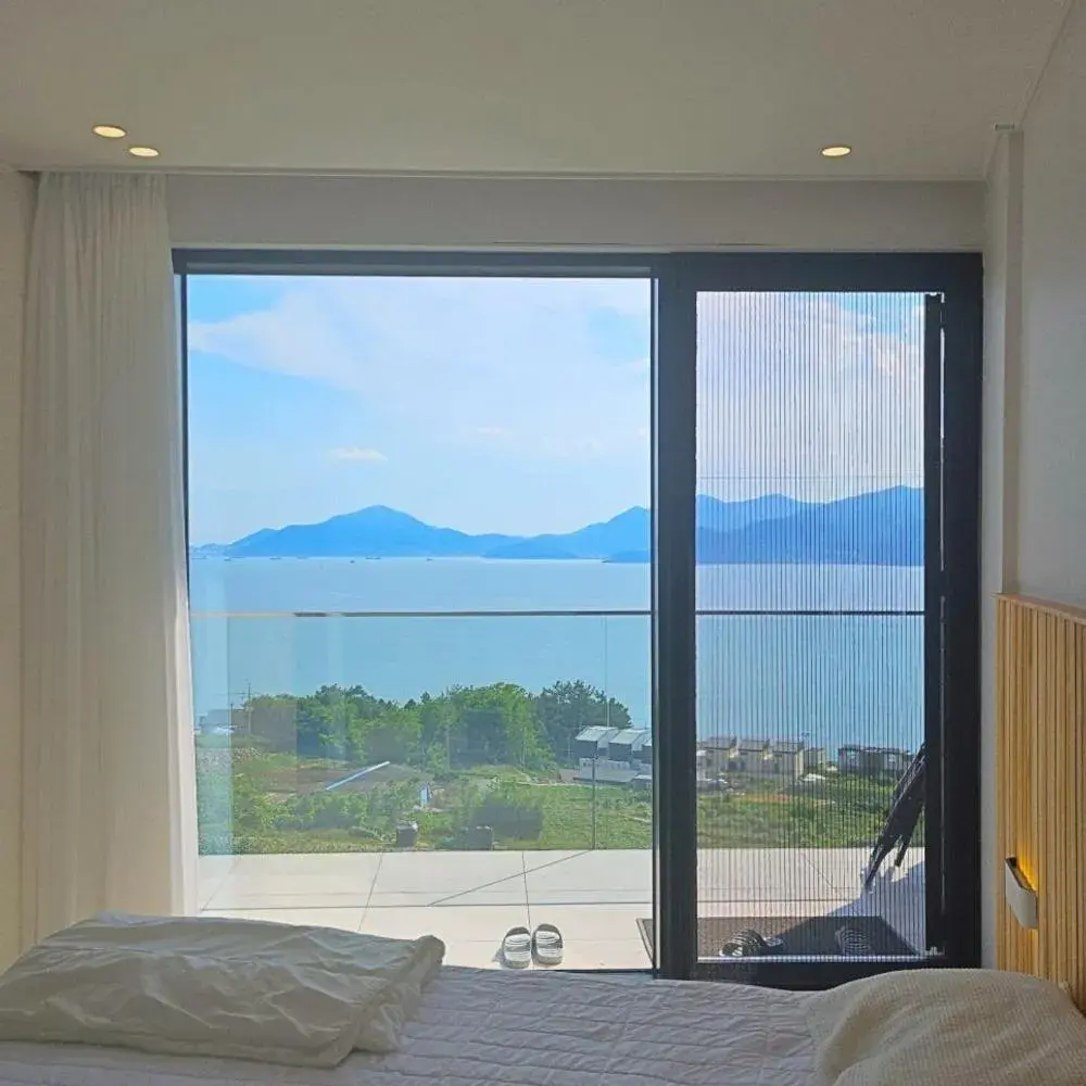 Bed in Namhae Staydan Pool Villa Bed in Namhae Staydan Pool Villa
