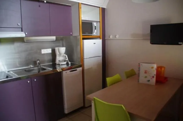 Kitchen or kitchenette in VVF Les Ecrins Champsaur