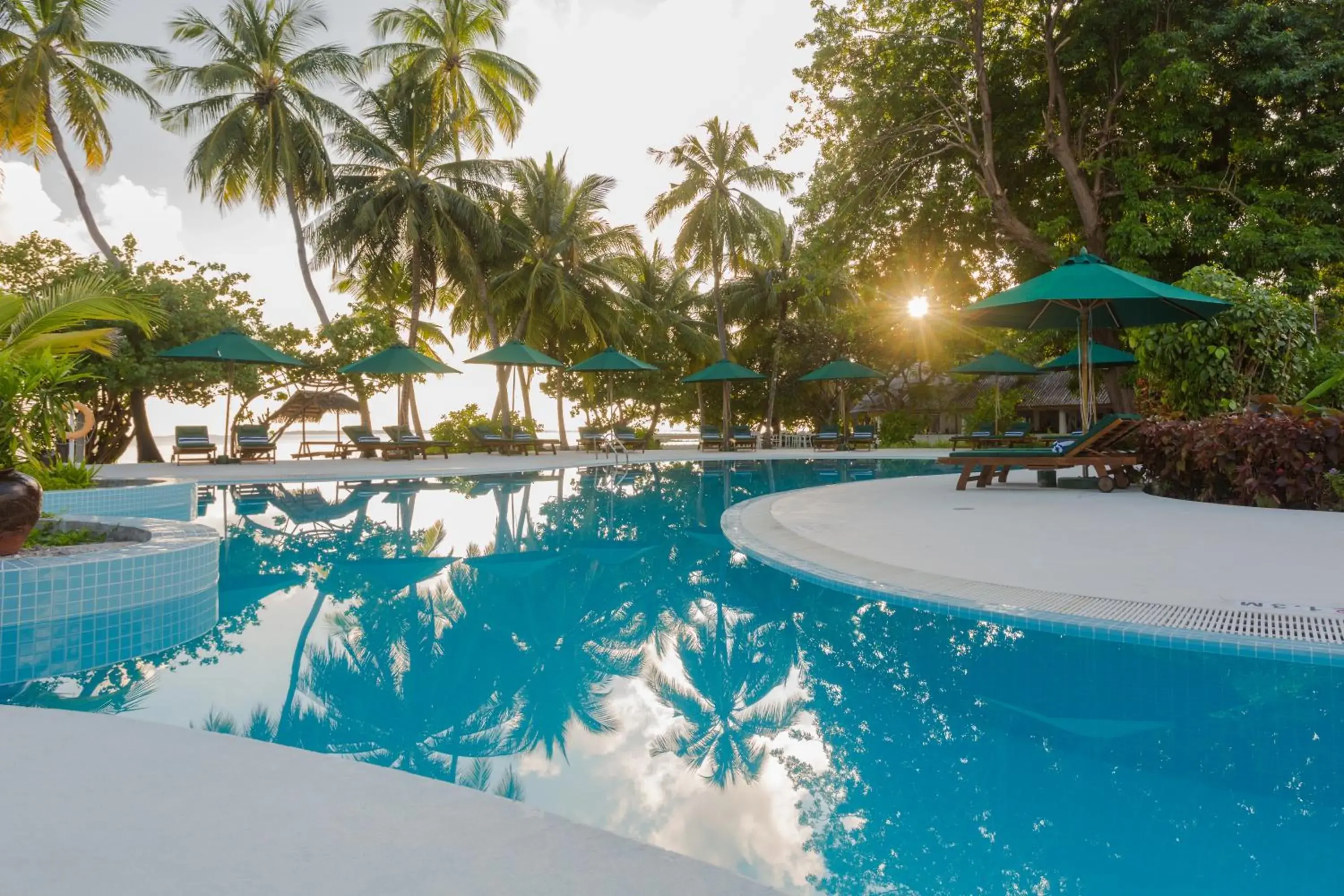 Pool view in Equator Village Maldives Pool view in Equator Village Maldives