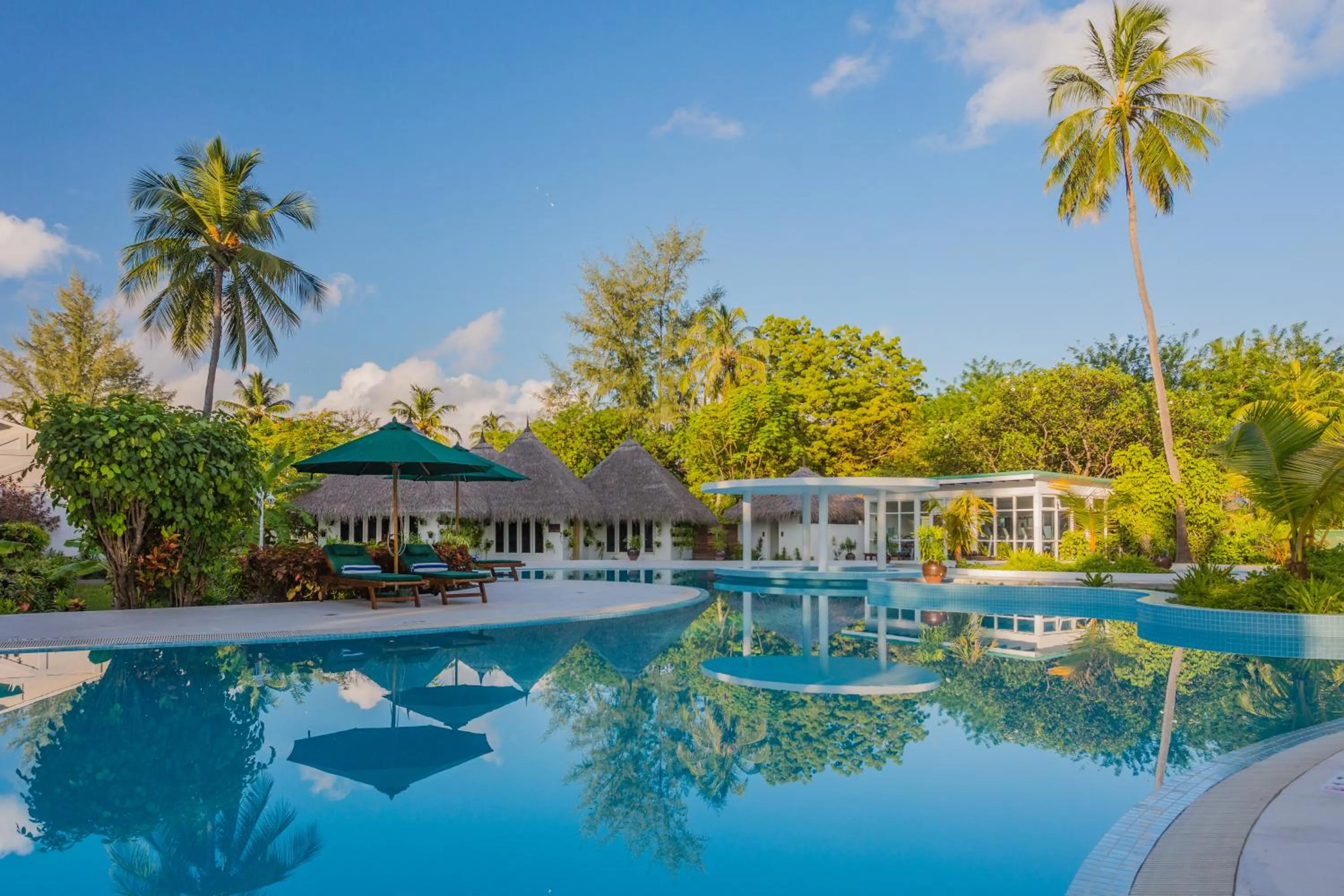 Pool view in Equator Village Maldives