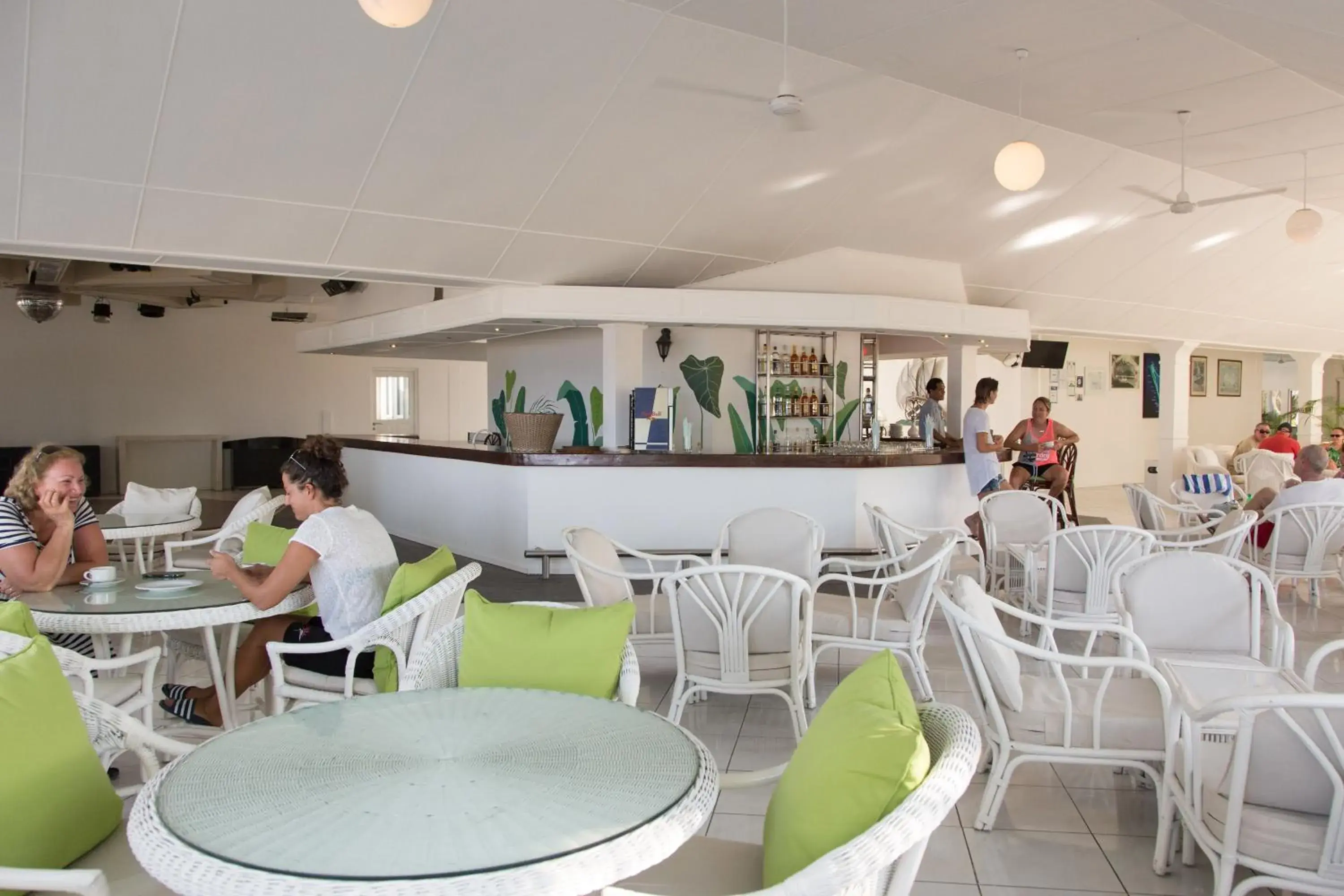 Lounge or bar in Equator Village Maldives Lounge or bar in Equator Village Maldives