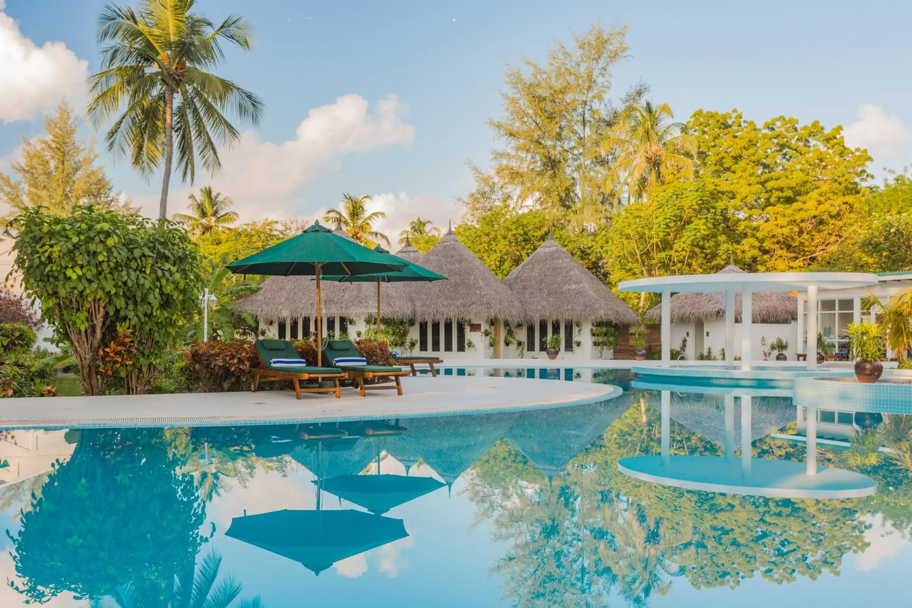 Pool view in Equator Village Maldives Pool view in Equator Village Maldives